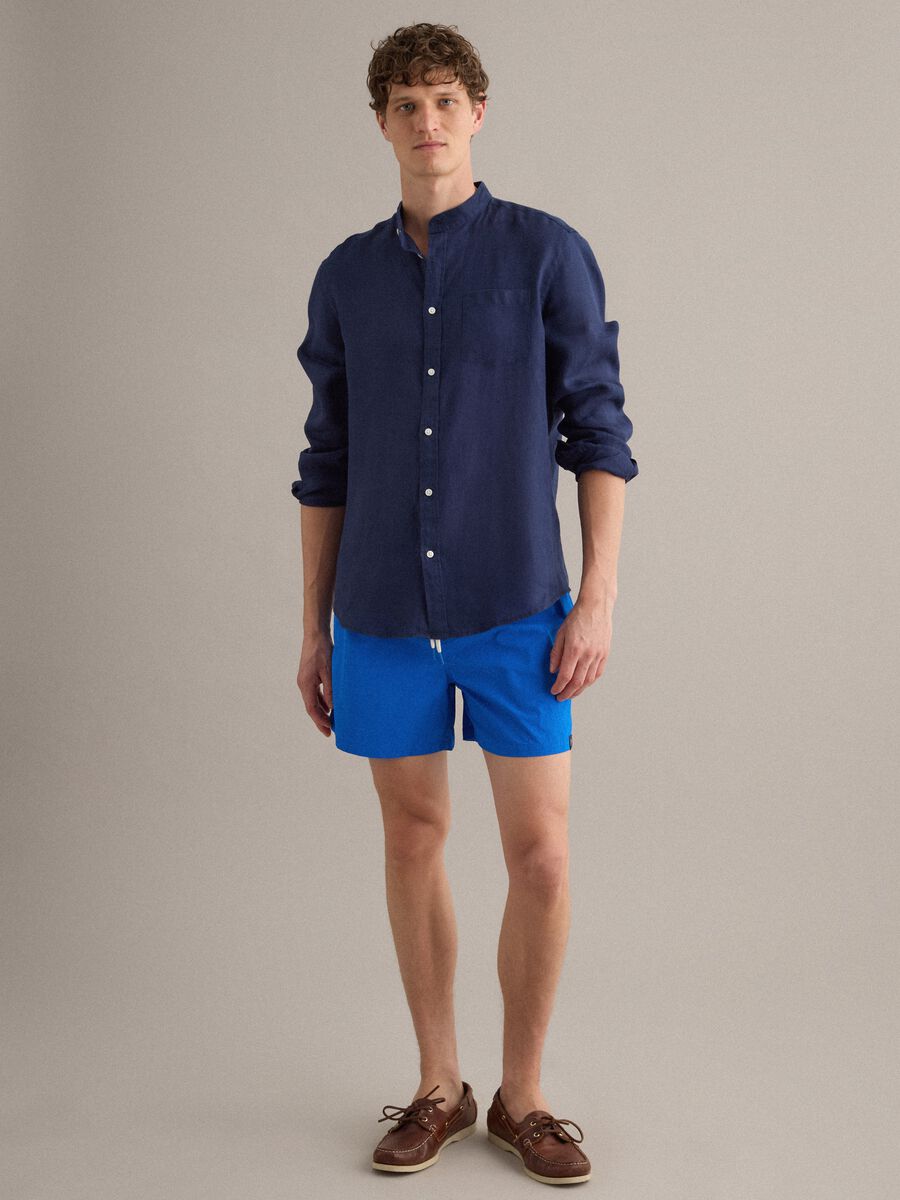 Blue swim shorts with elasticated waist and drawstring_3