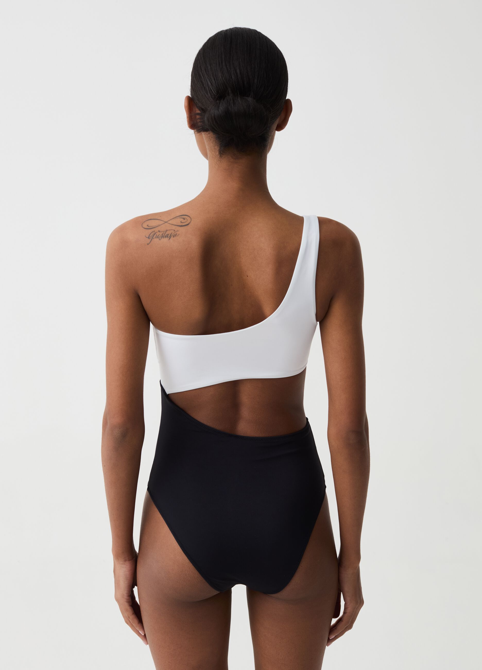 Two-tone one-piece swimsuit with one shoulder strap