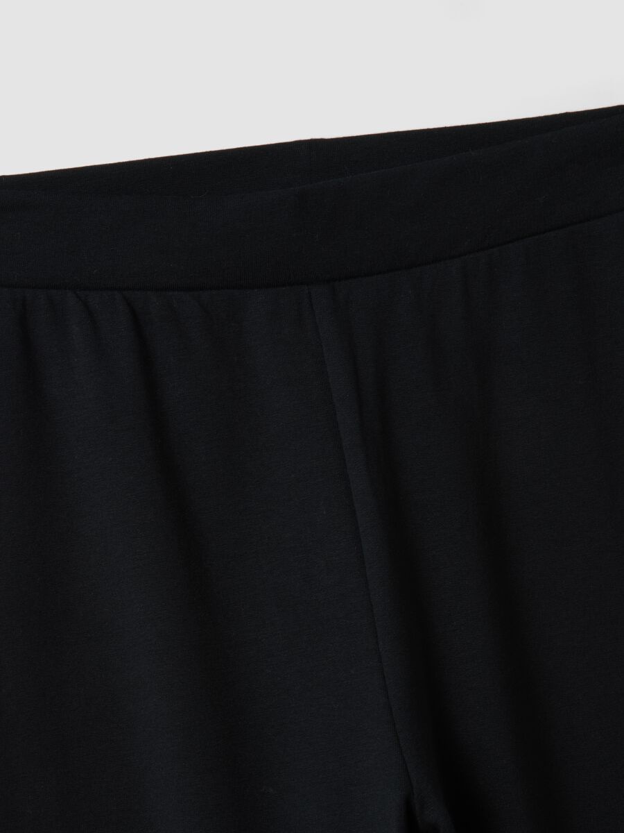 Leggings neri flare in cotone elasticizzato_1