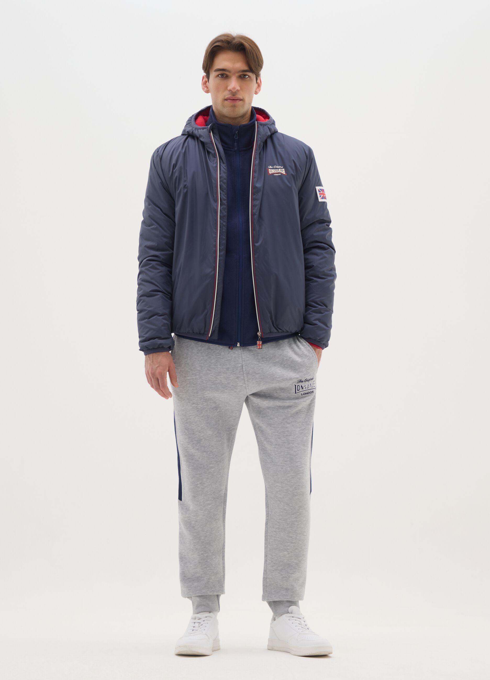 Blue padded jacket with hood and zip