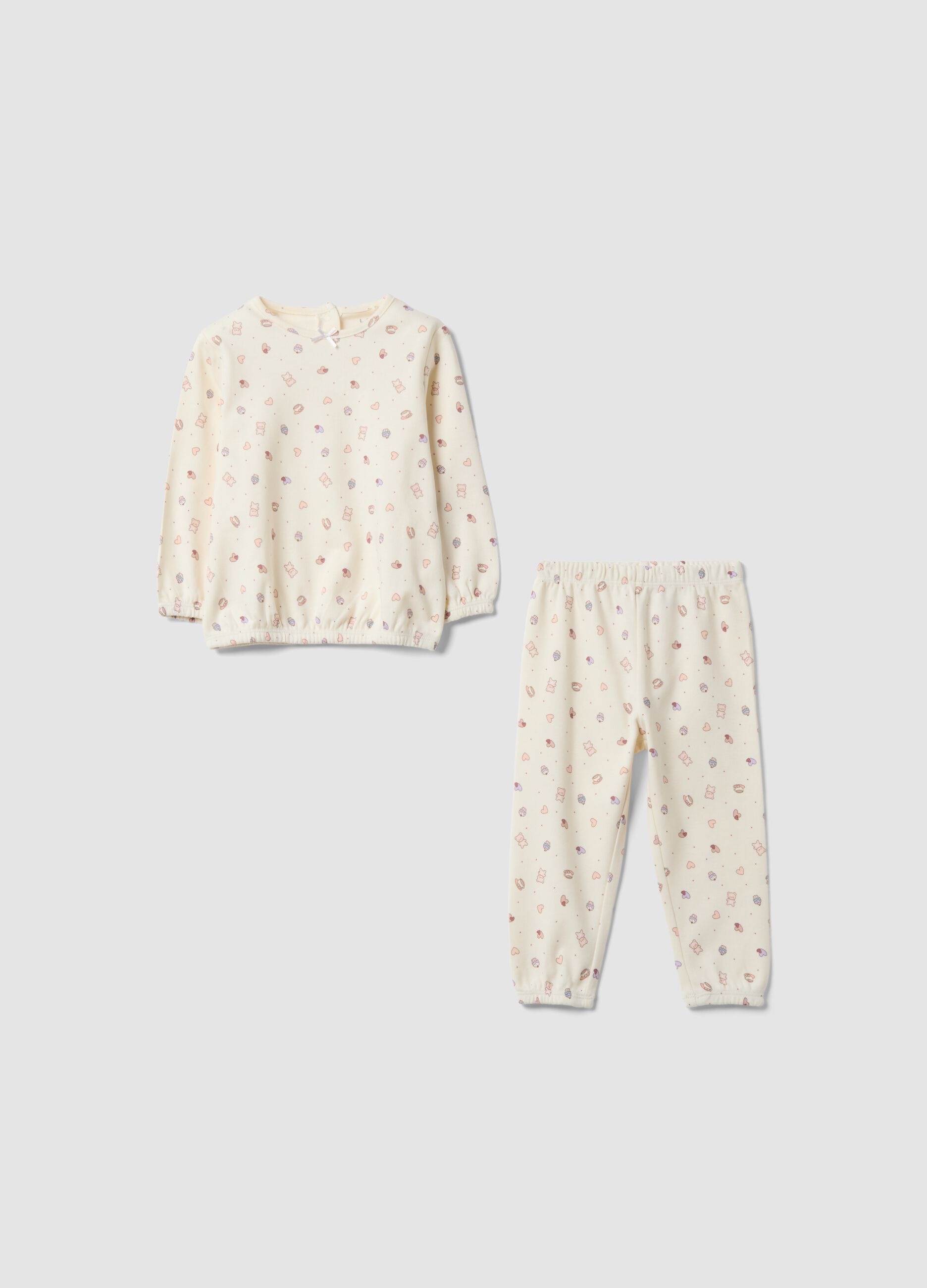 White organic cotton pyjamas with hearts and teddy bear print for baby girl