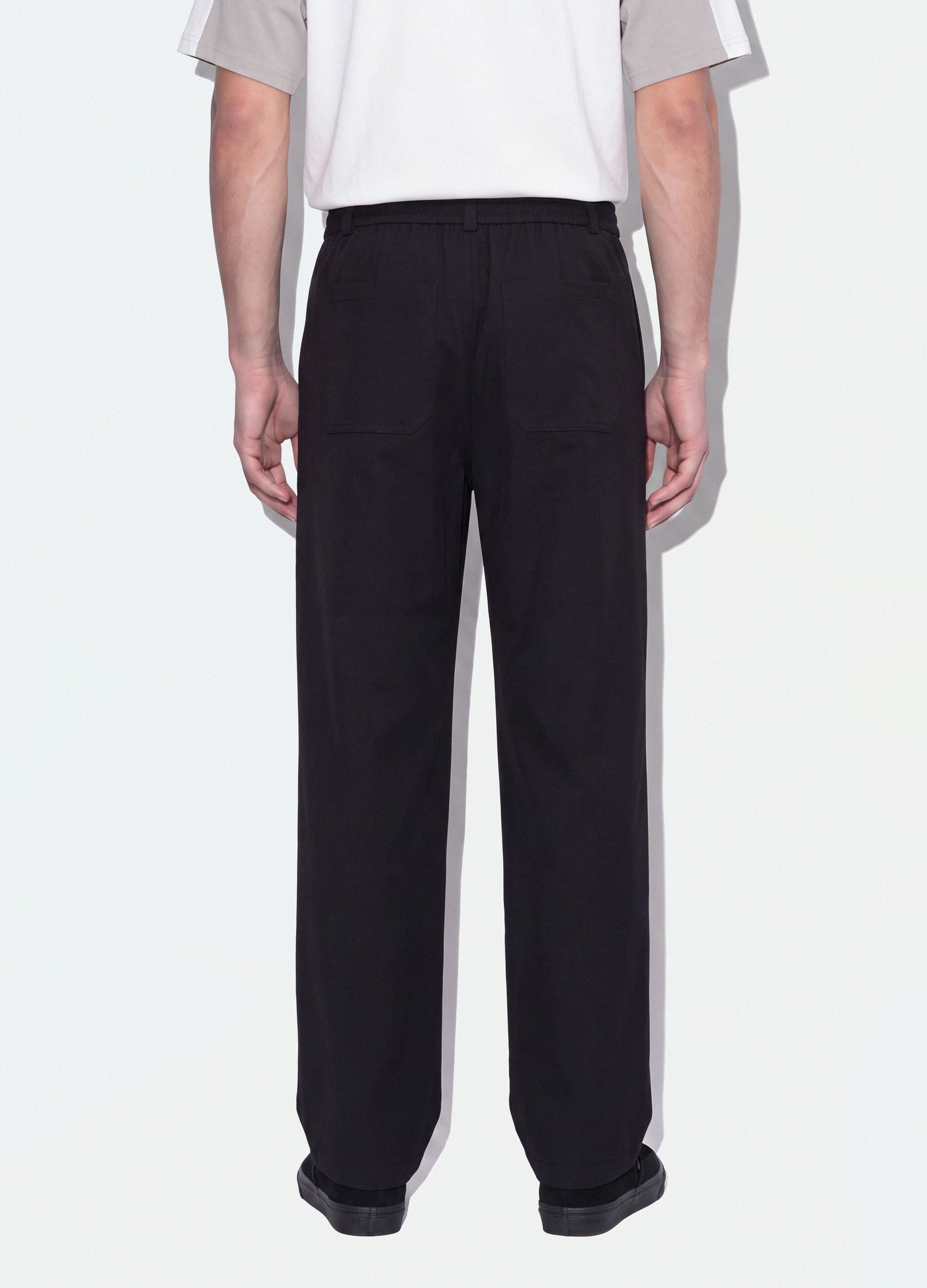 Black stretch-fabric parachute-fit trousers
