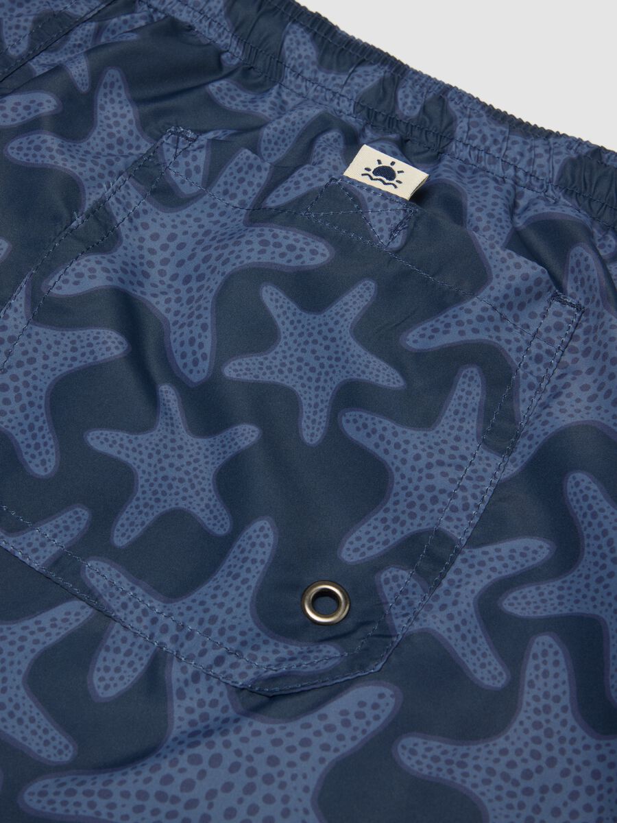 Blue swim shorts with starfish print_5