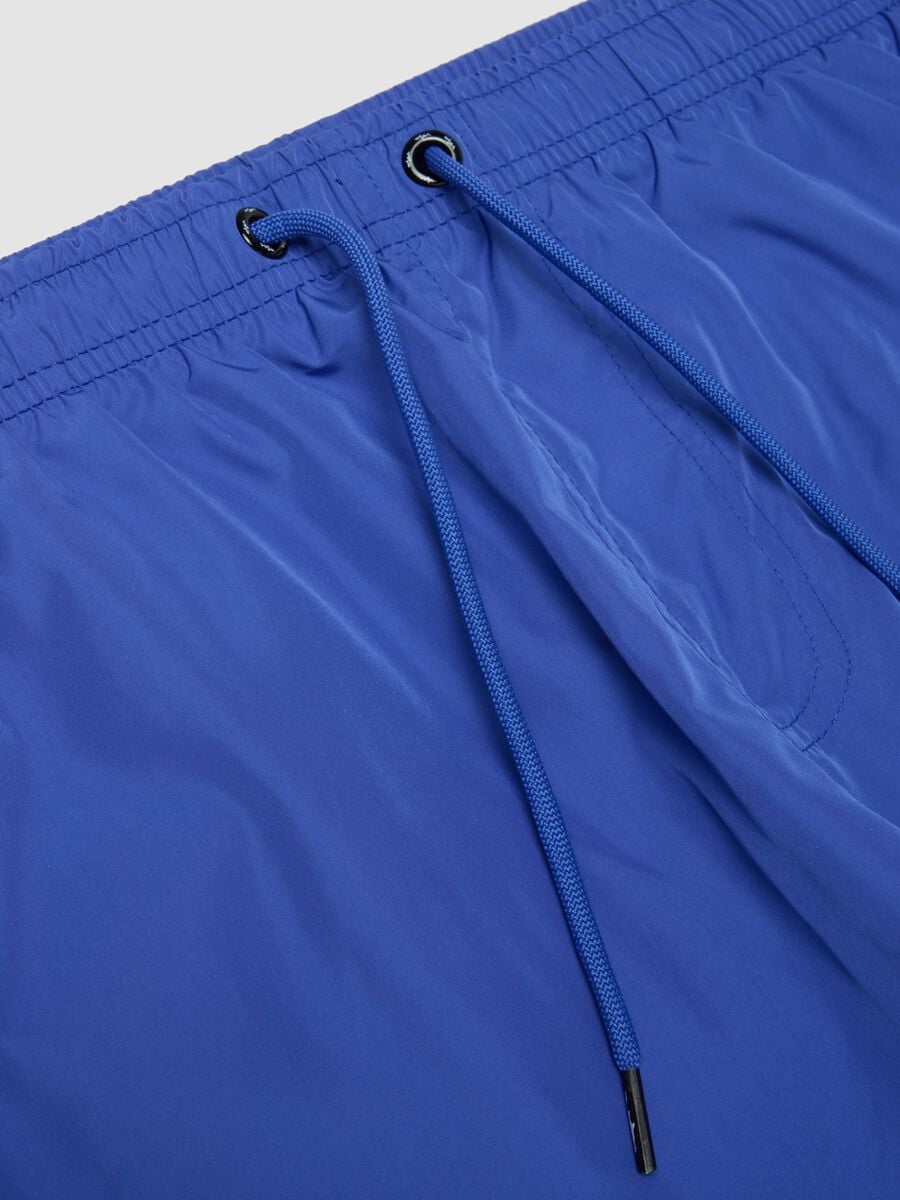 Short de bain bleu avec taille &eacute;lastiqu&eacute;e et cordon de serrage_1