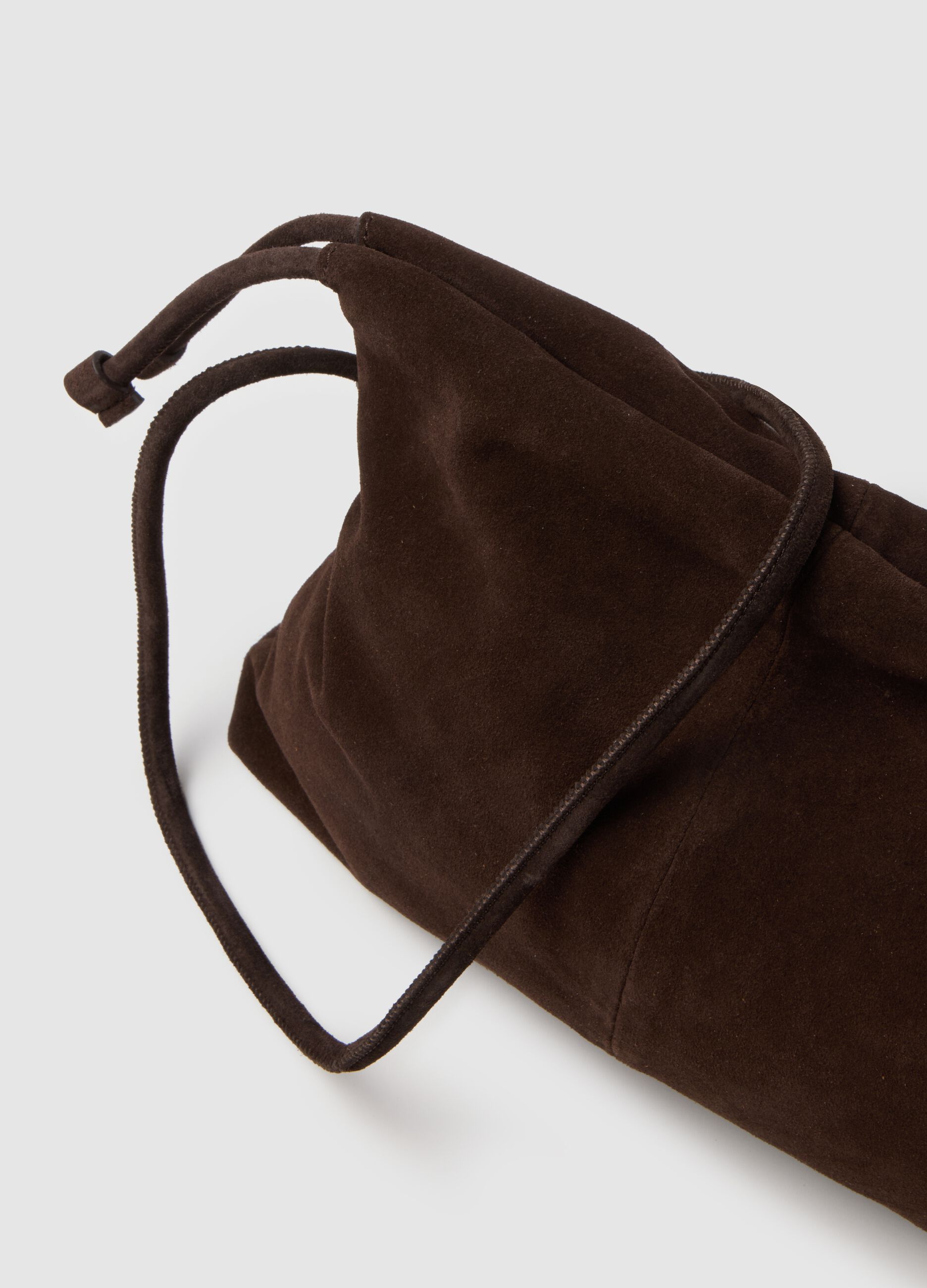Genuine brown leather bag with drawstring closure