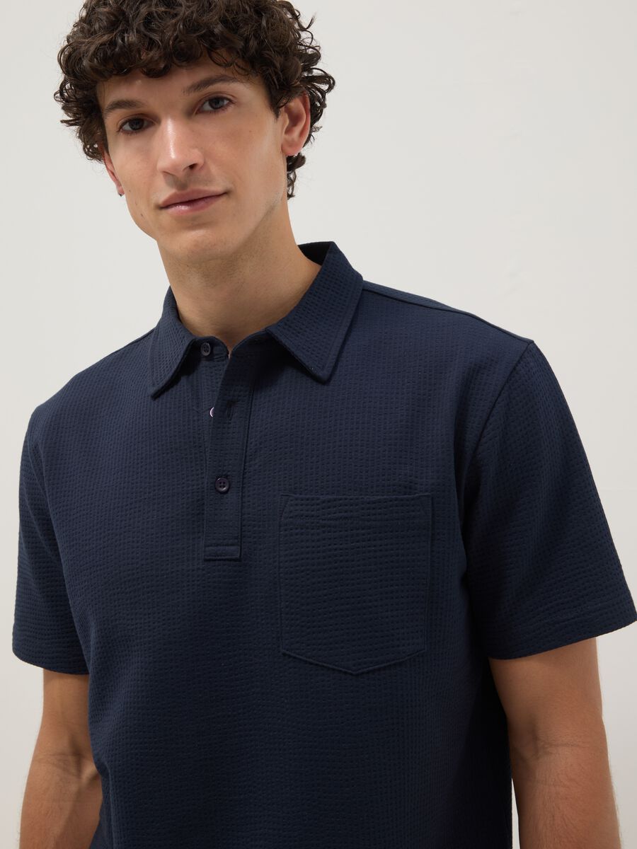Blue short-sleeved stretch polo shirt_0
