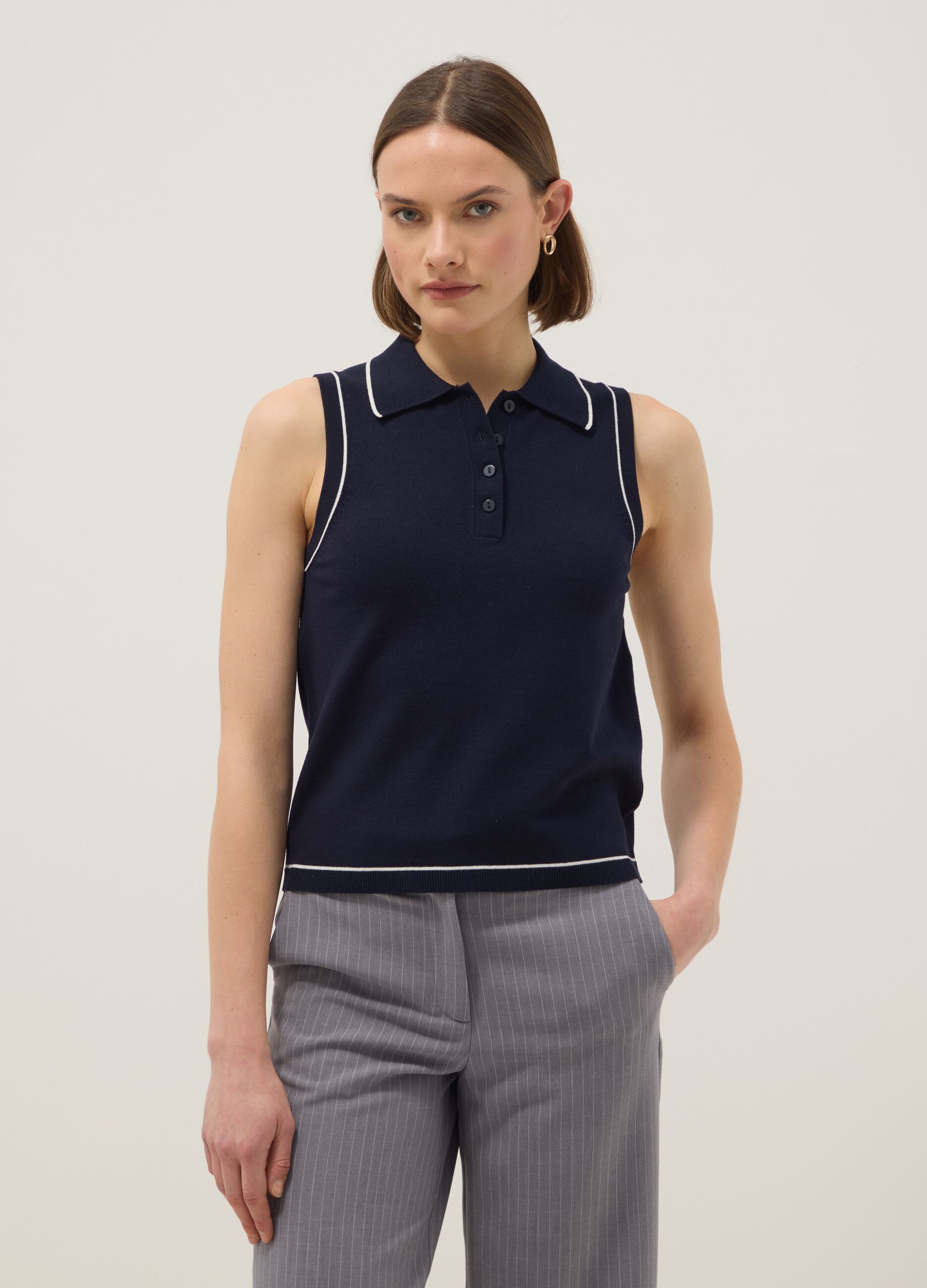 Sleeveless blue viscose blend slim fit polo with buttons