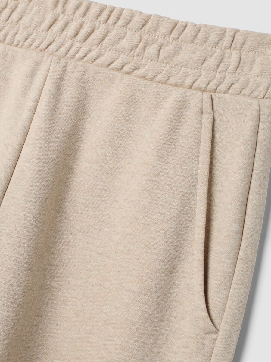 Beige cotton-blend straight-fit trousers_1