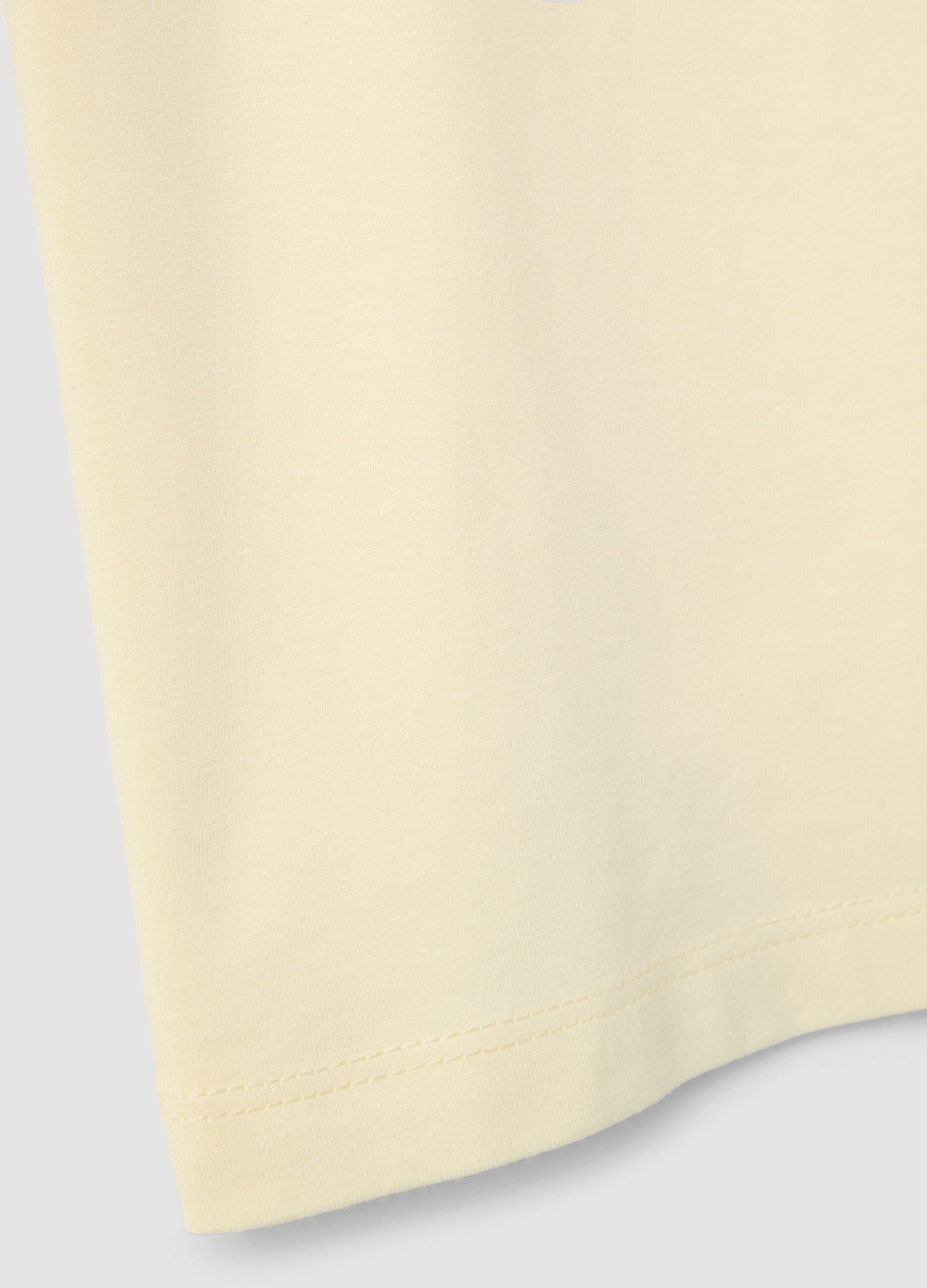 T-shirt amarela de algod&atilde;o org&acirc;nico puro para menina com estampado e glitter