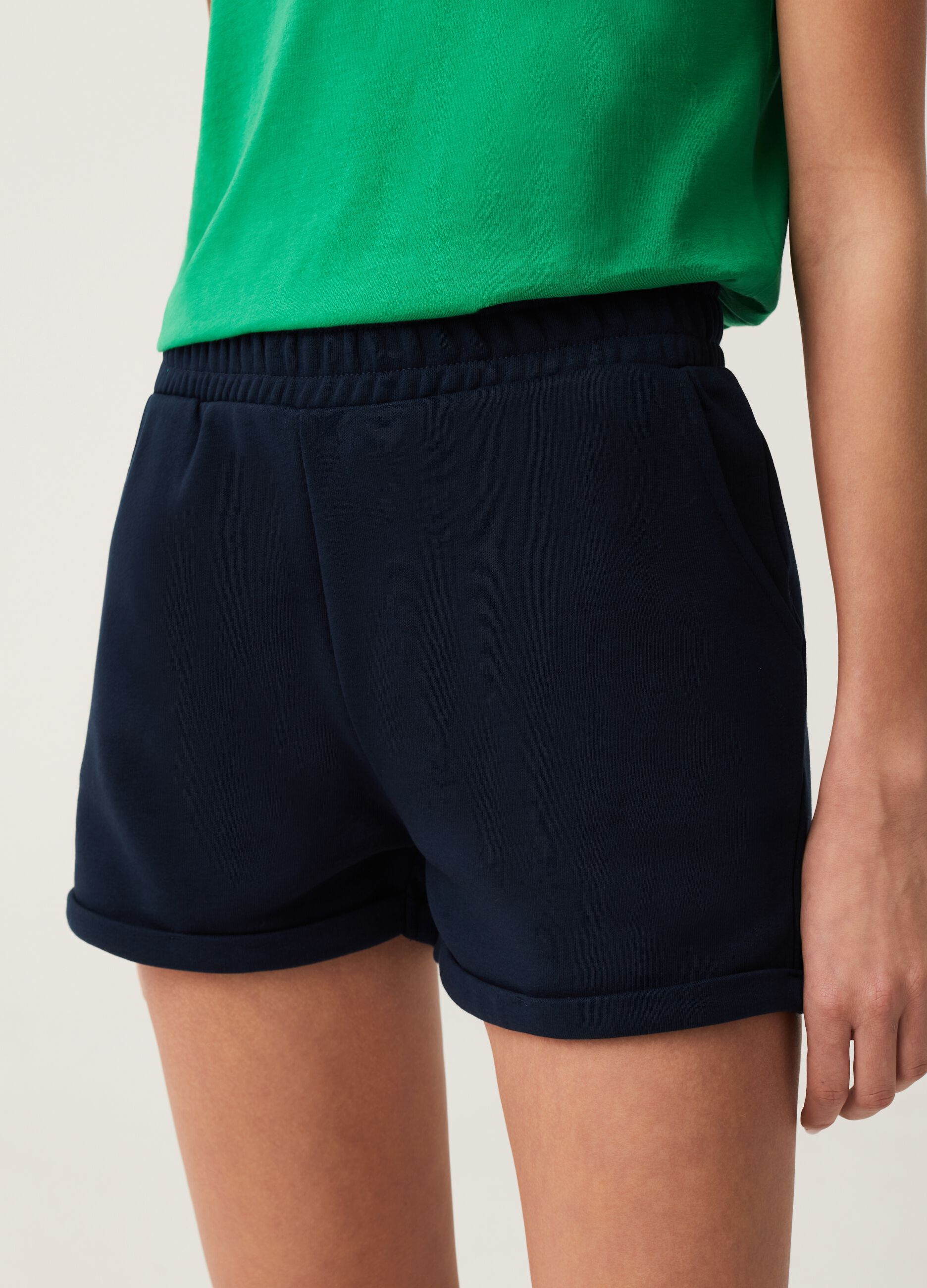 Shorts Fitness in French Terry con risvolti