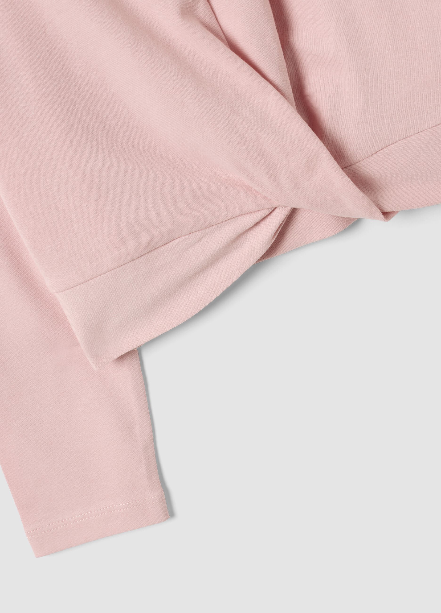 T-shirt rosa in cotone elasticizzato con nodo frontale e stampa per bambina