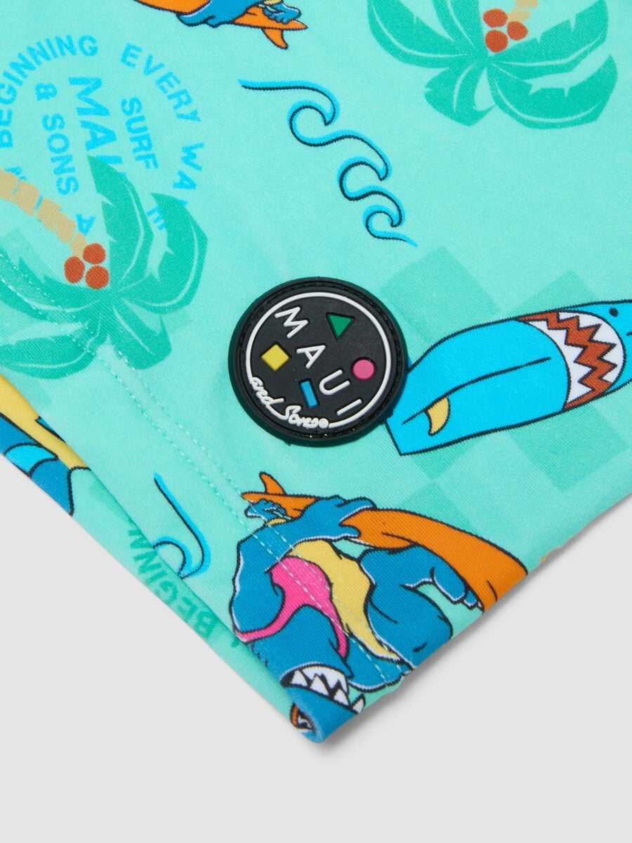 B&oacute;xer de ba&ntilde;o azul para ni&ntilde;o en tejido el&aacute;stico con estampado_3