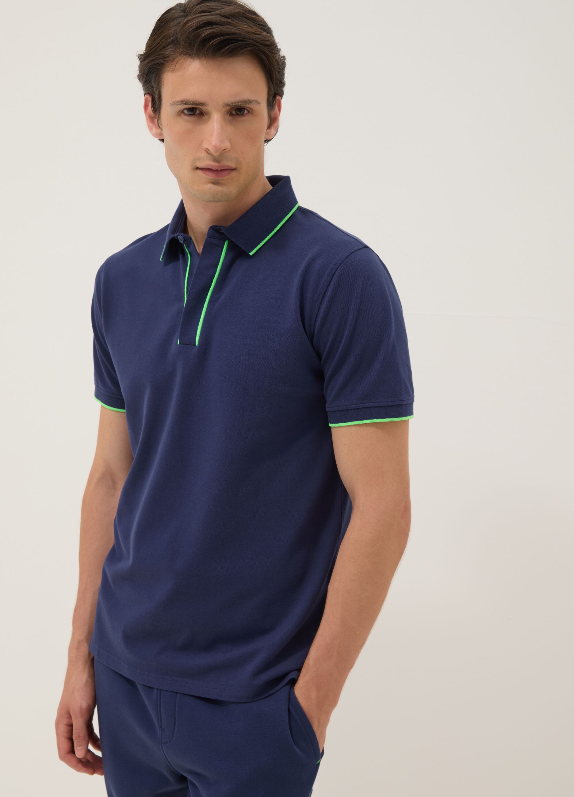 Blue short-sleeved polo in stretch cotton