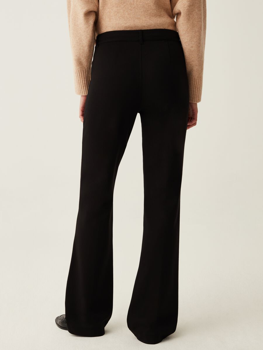 Flare-fit trousers with pockets_2