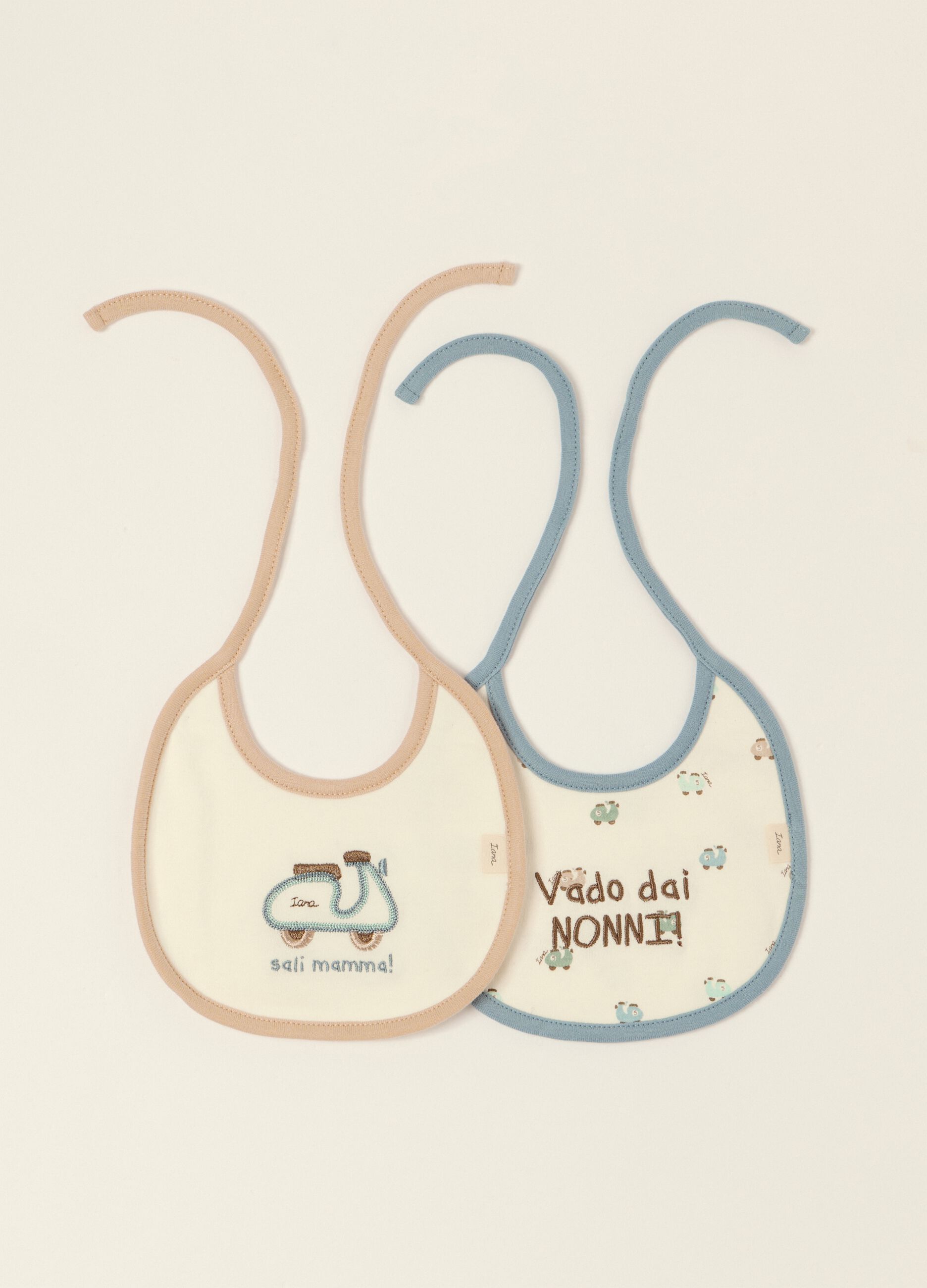 Two-pack of multicolour printed baby bibs in pure cotton
