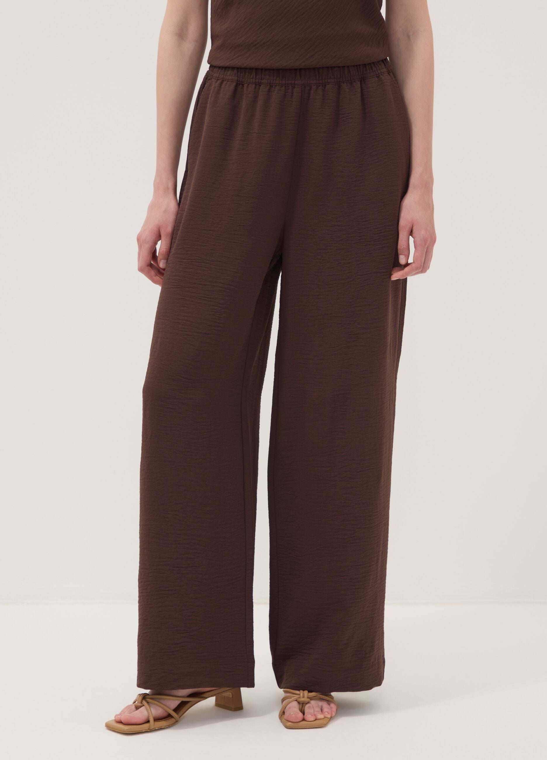 Brown wide-leg trousers with elasticated waistband