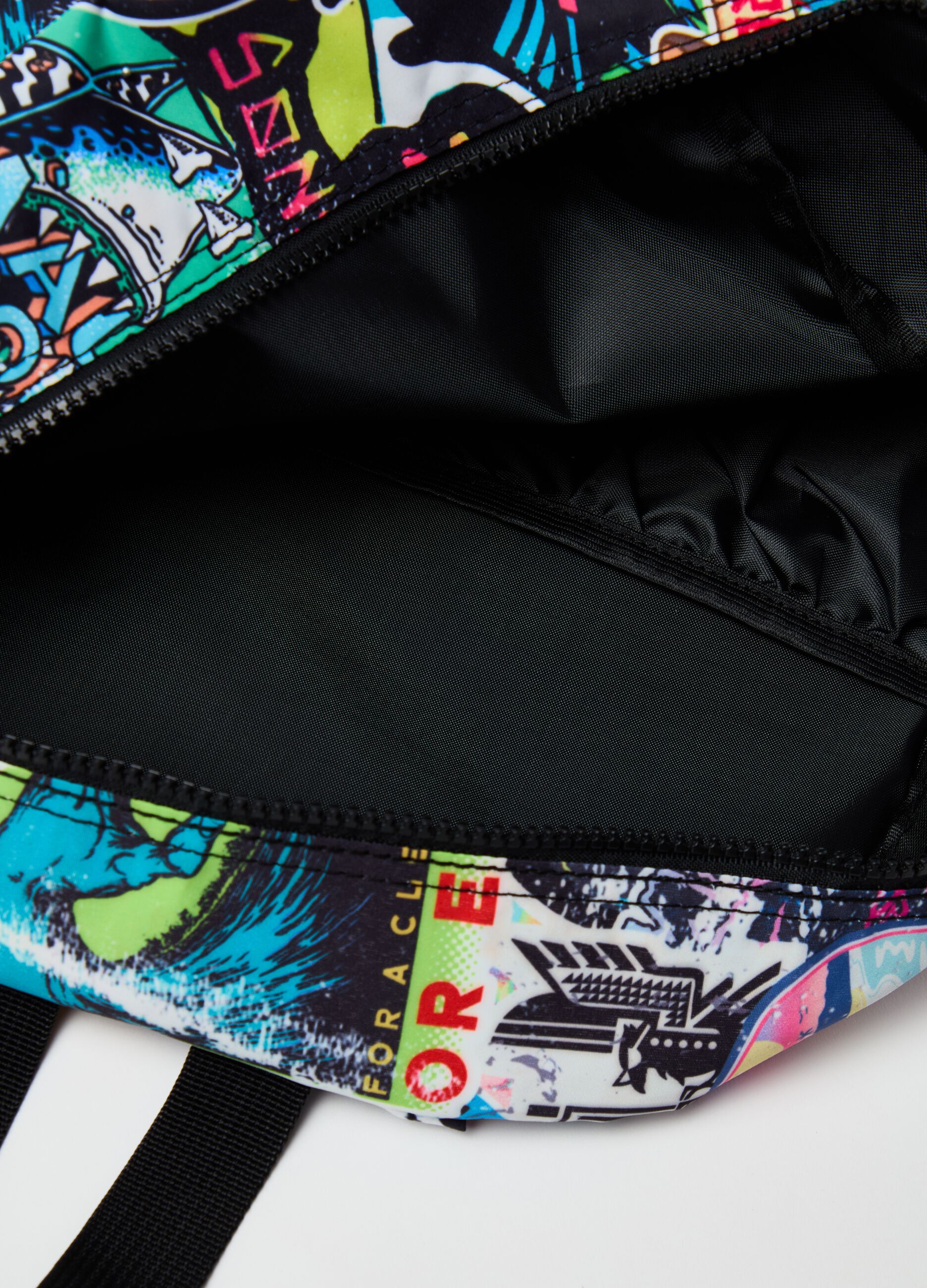Oval backpack with graffiti print