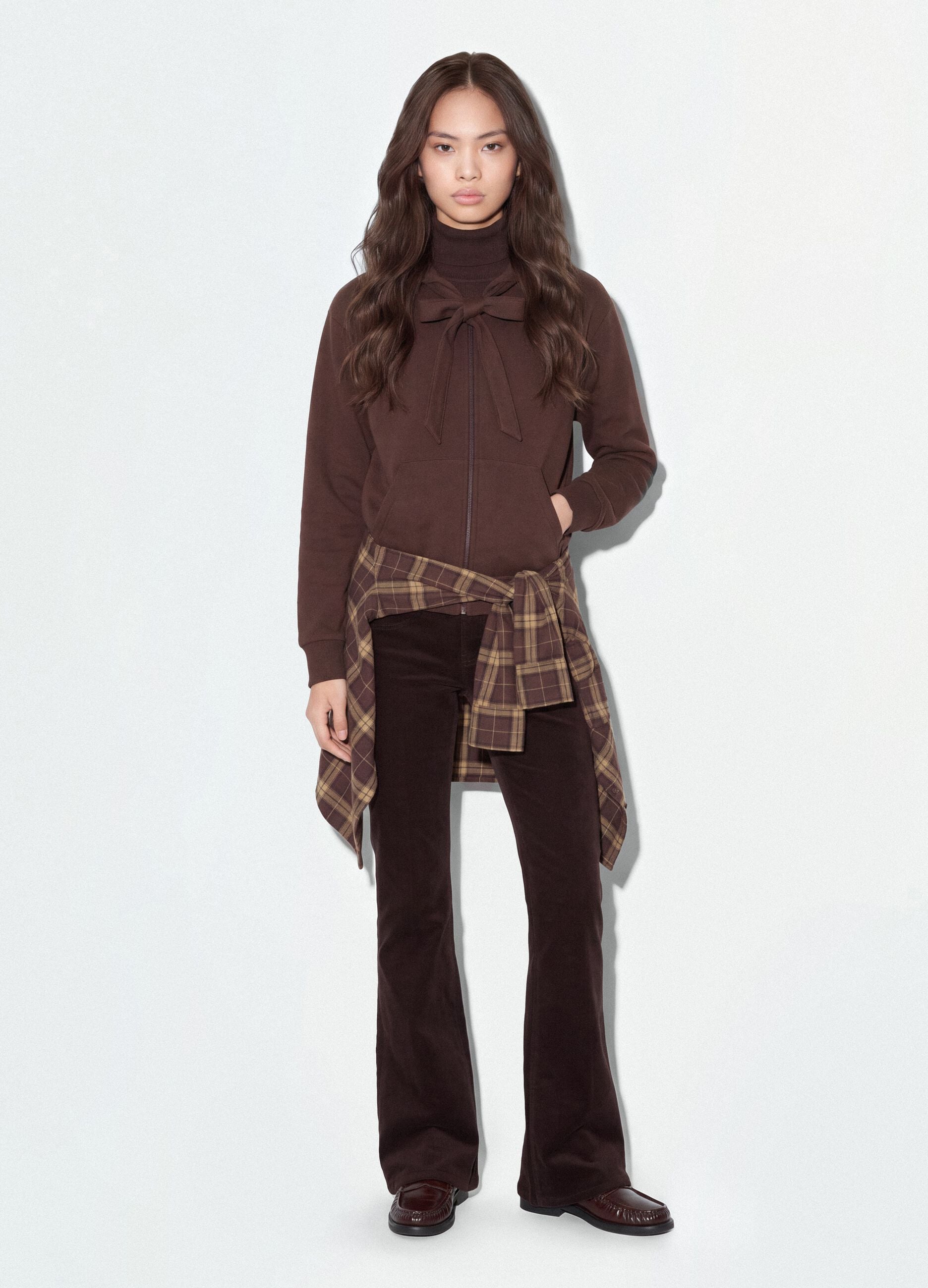 Brown hoodie with tied drawstring, relaxed fit