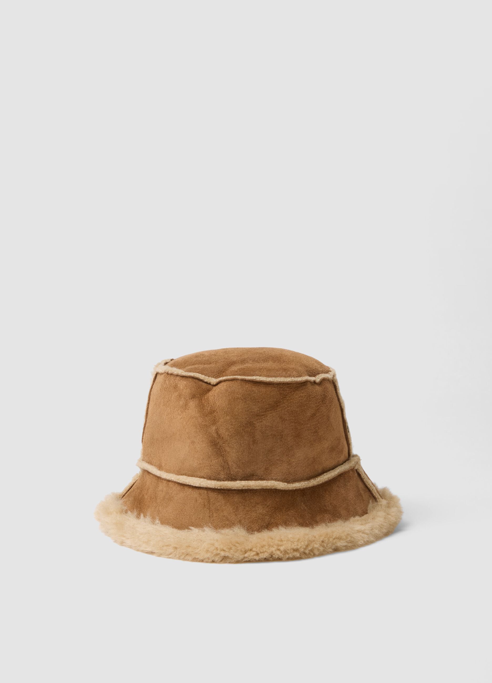 Brown genuine leather hat with shearling-effect trim