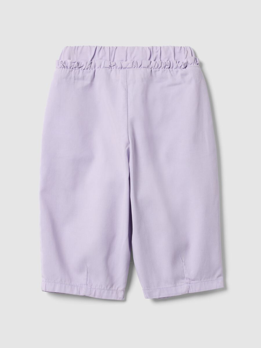 Purple lyocell and cotton baggy trousers for girls_1
