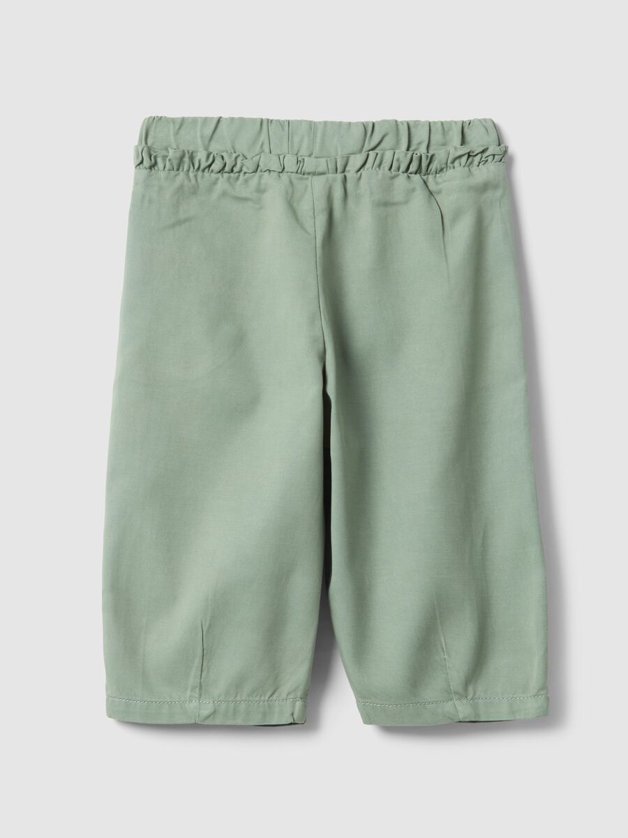 Green girl's baggy trousers in lyocell and cotton_1