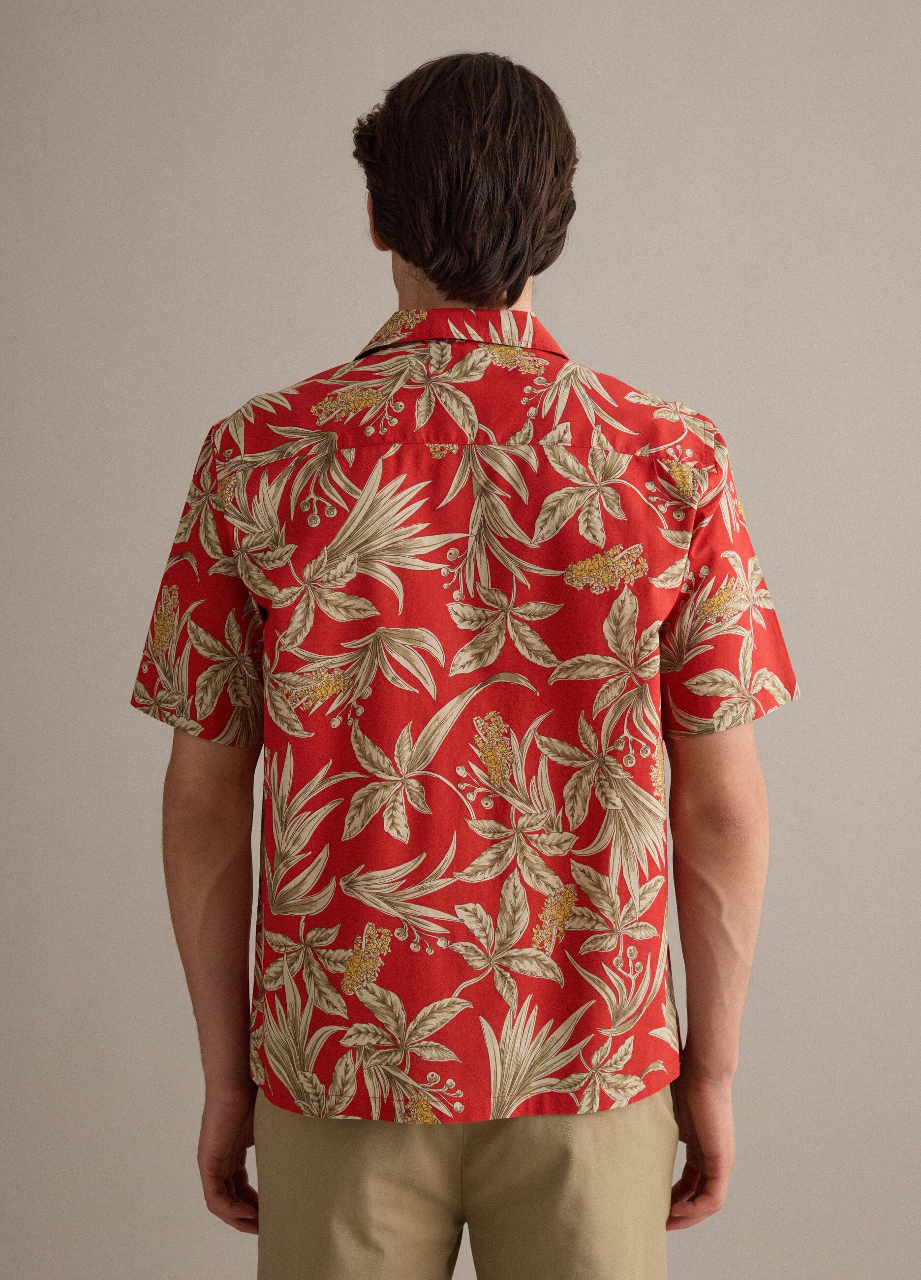 Red organic cotton shirt with tropical print