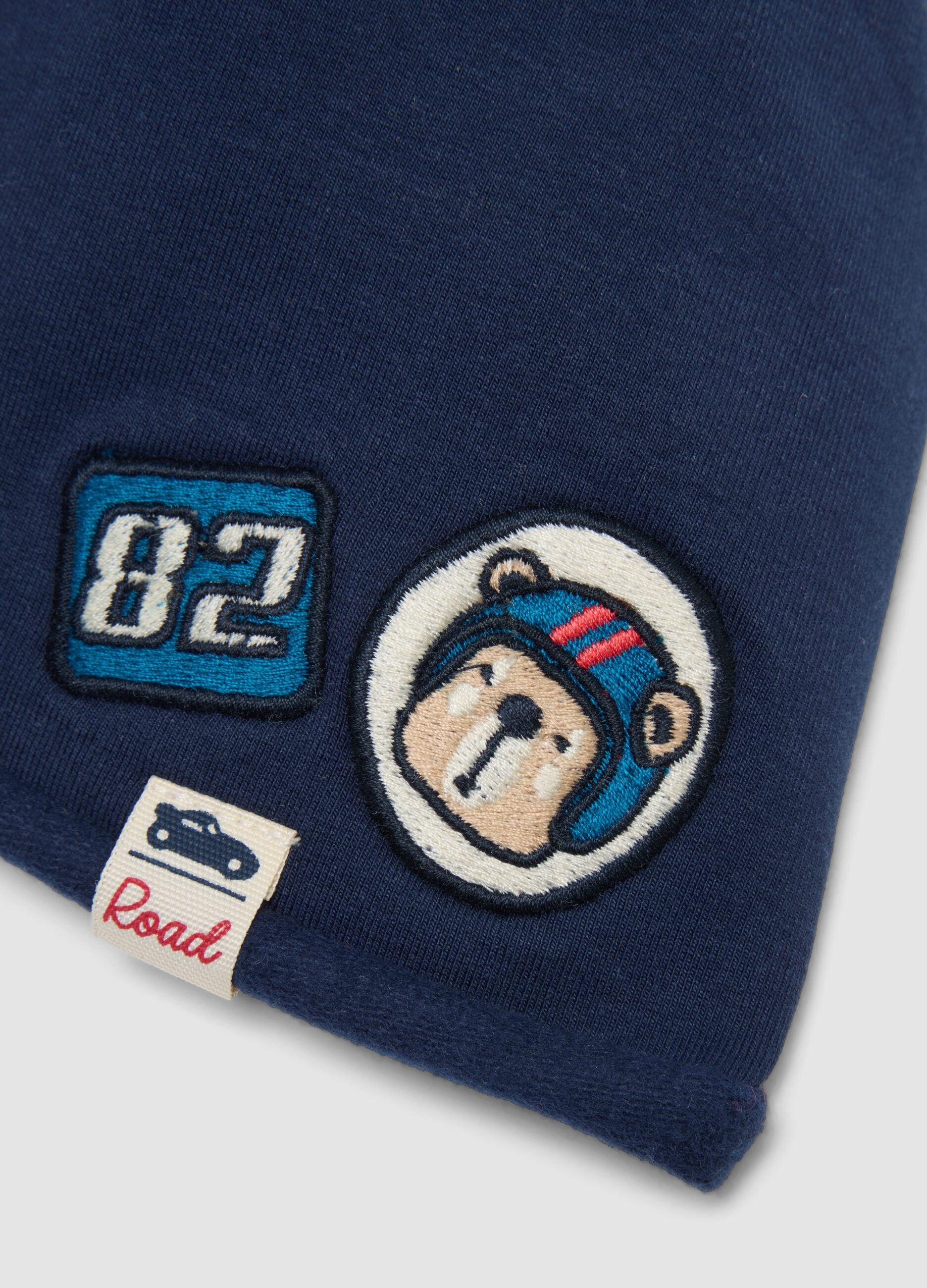 Blue organic stretch cotton jersey hat with appliqu&eacute;s