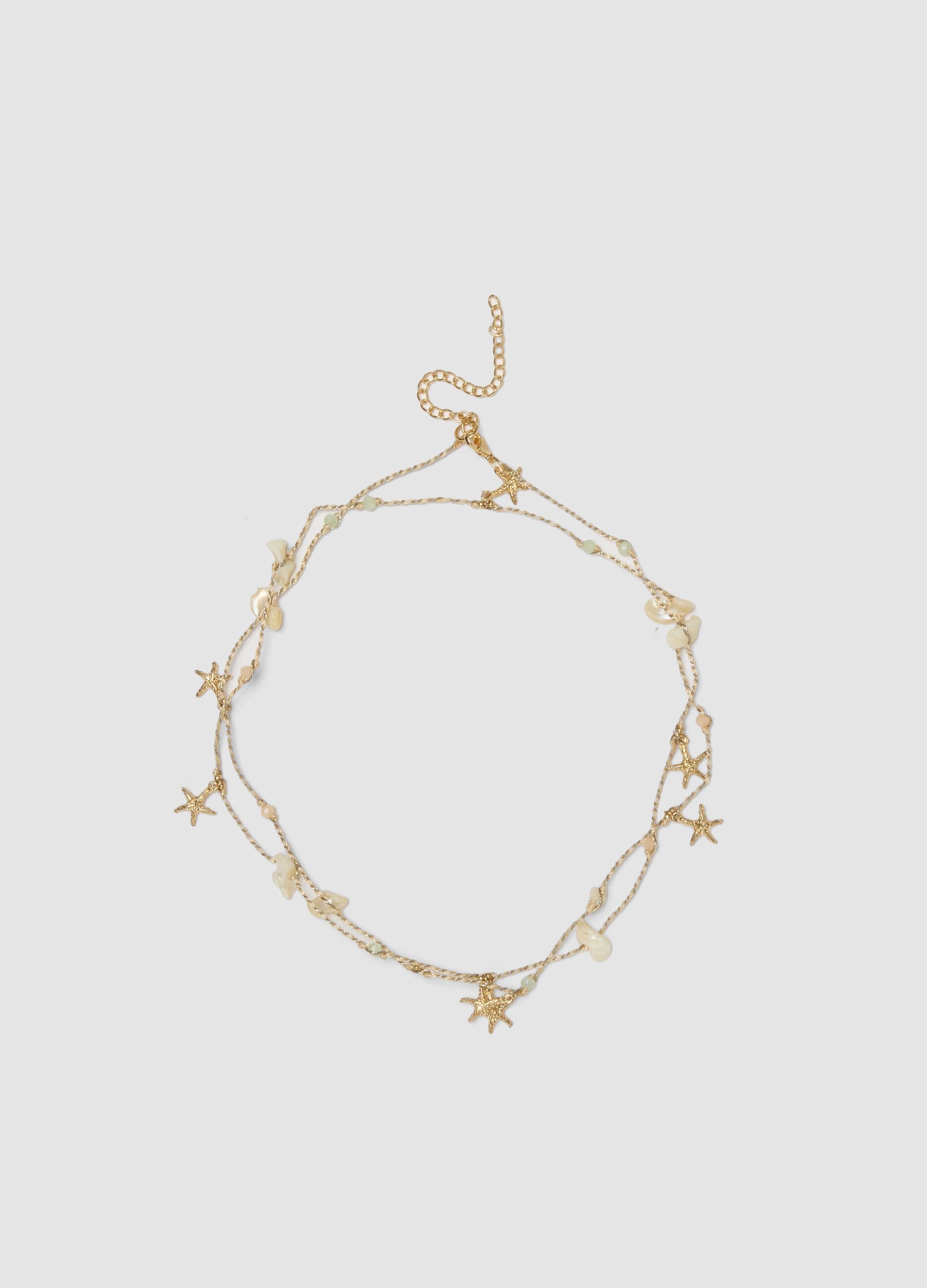 Beige Halskette mit maritimen Anh&auml;ngern und Steinen