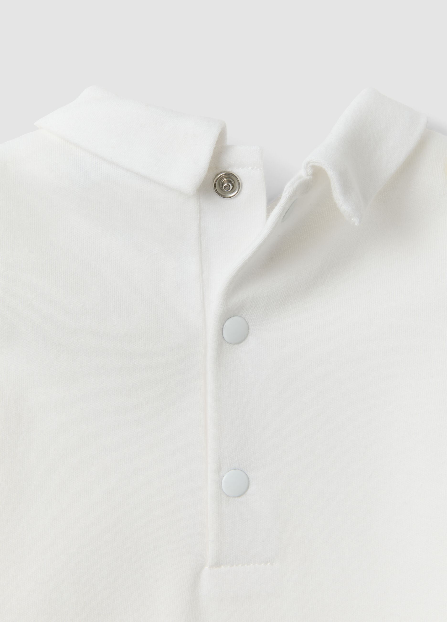 White organic cotton baby bodysuit with collar