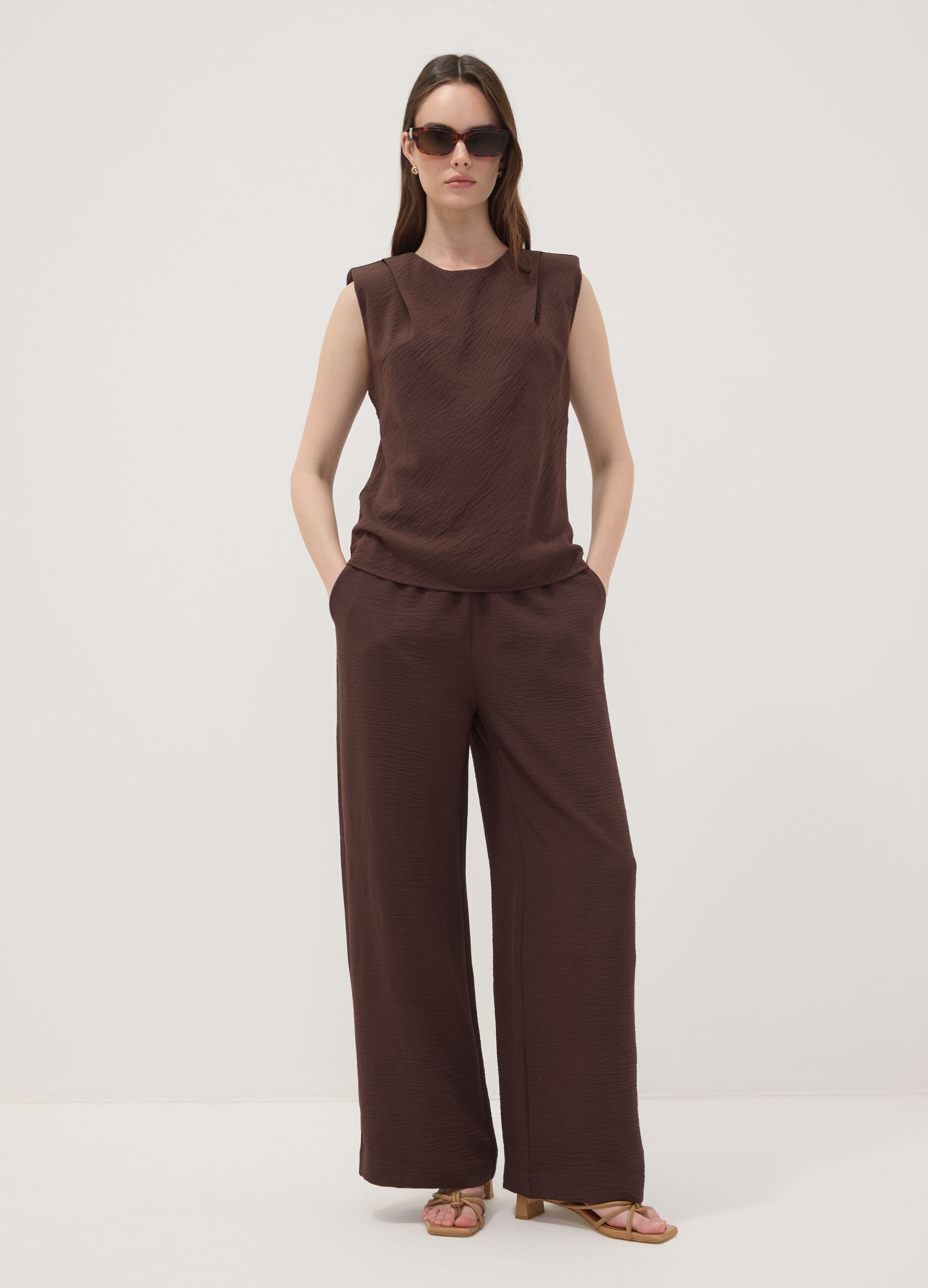 Brown sleeveless pleated-texture blouse, regular fit