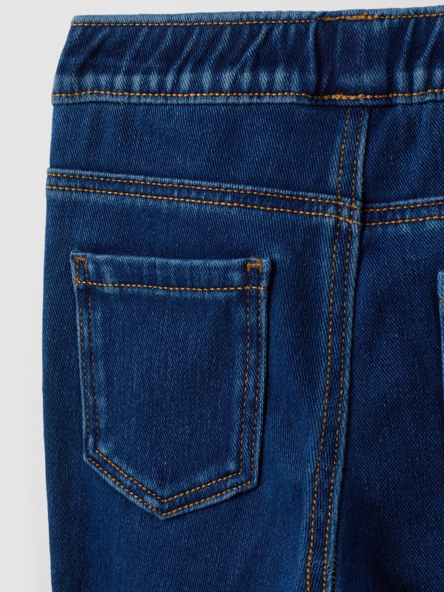 Blue flare-fit stretchy cotton jeggings for girls_3