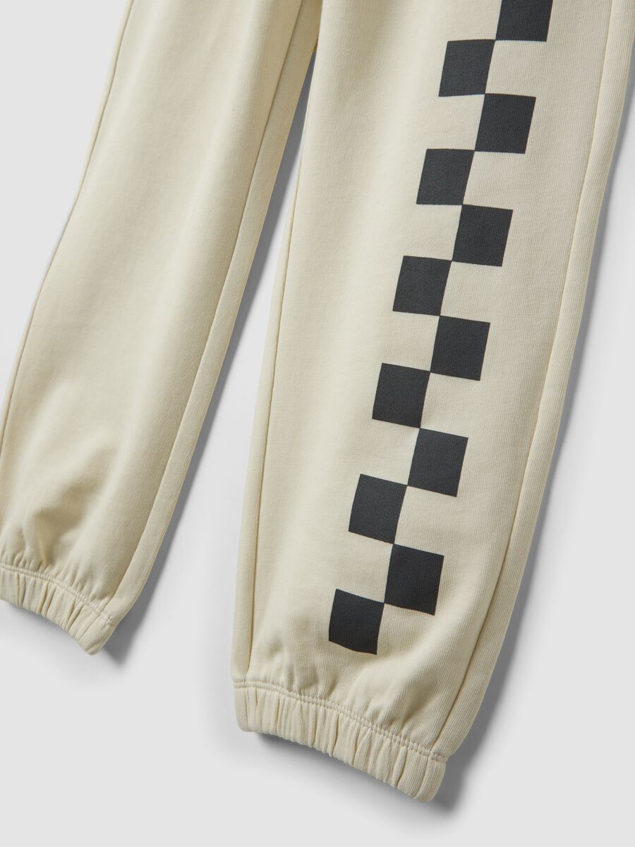 Pantalon jogger blanc en pur coton &agrave; imprim&eacute; carreaux, coupe confort_1
