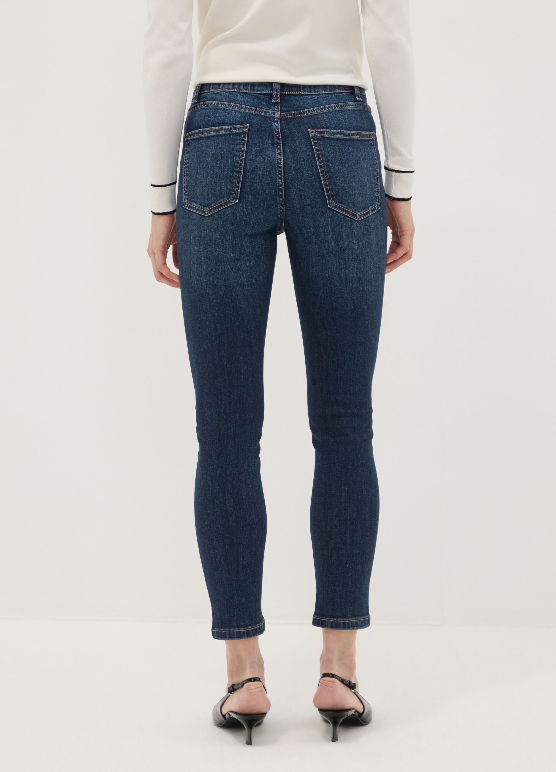 Mid-wash skinny-fit jeans in stretch cotton