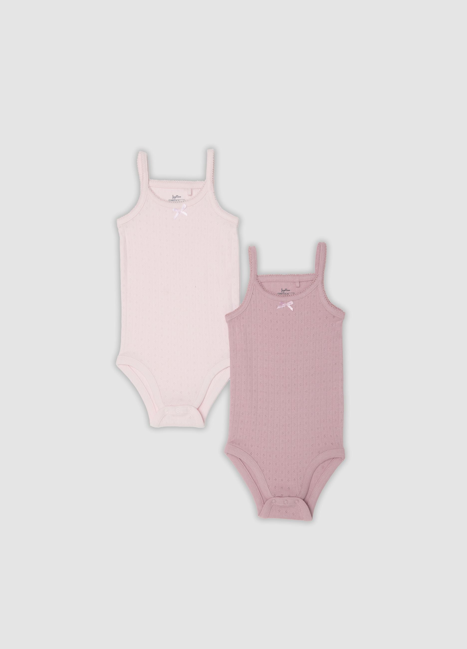 2-pack of pink organic cotton bodysuits for baby girls