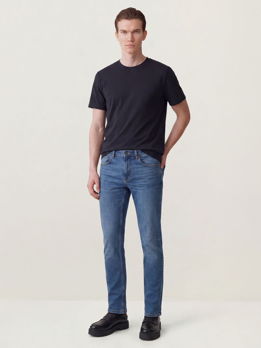 Jeans azuis slim fit em algod&atilde;o el&aacute;stico_0