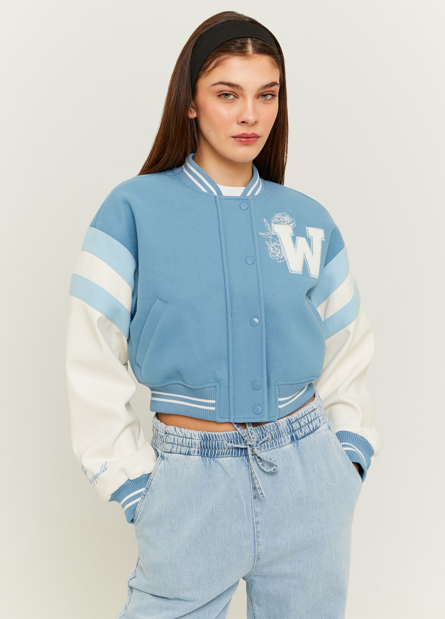 Varsity bomber jacket with embroidery and bouclé application
