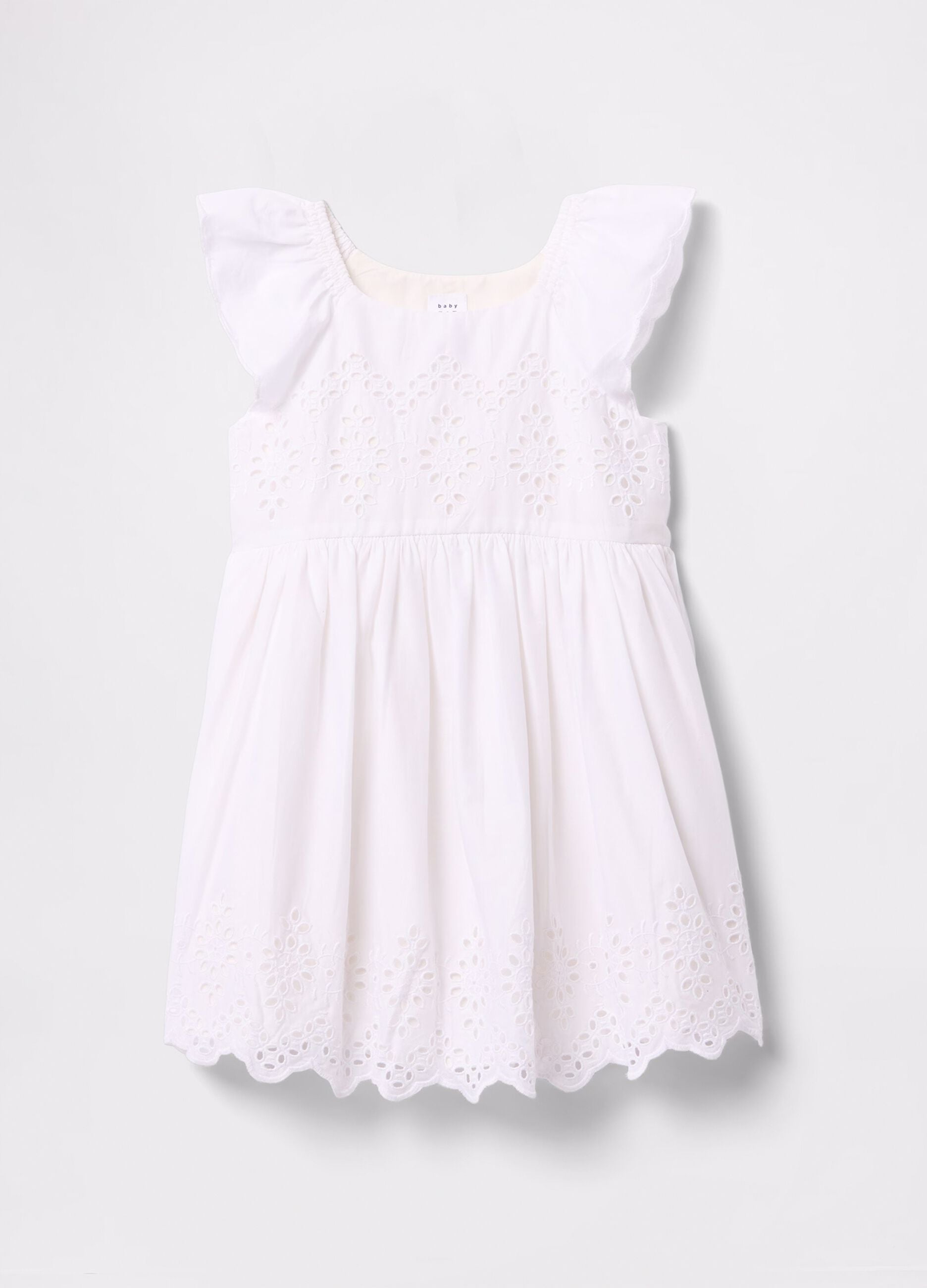 White dress in cotton with openwork flowers