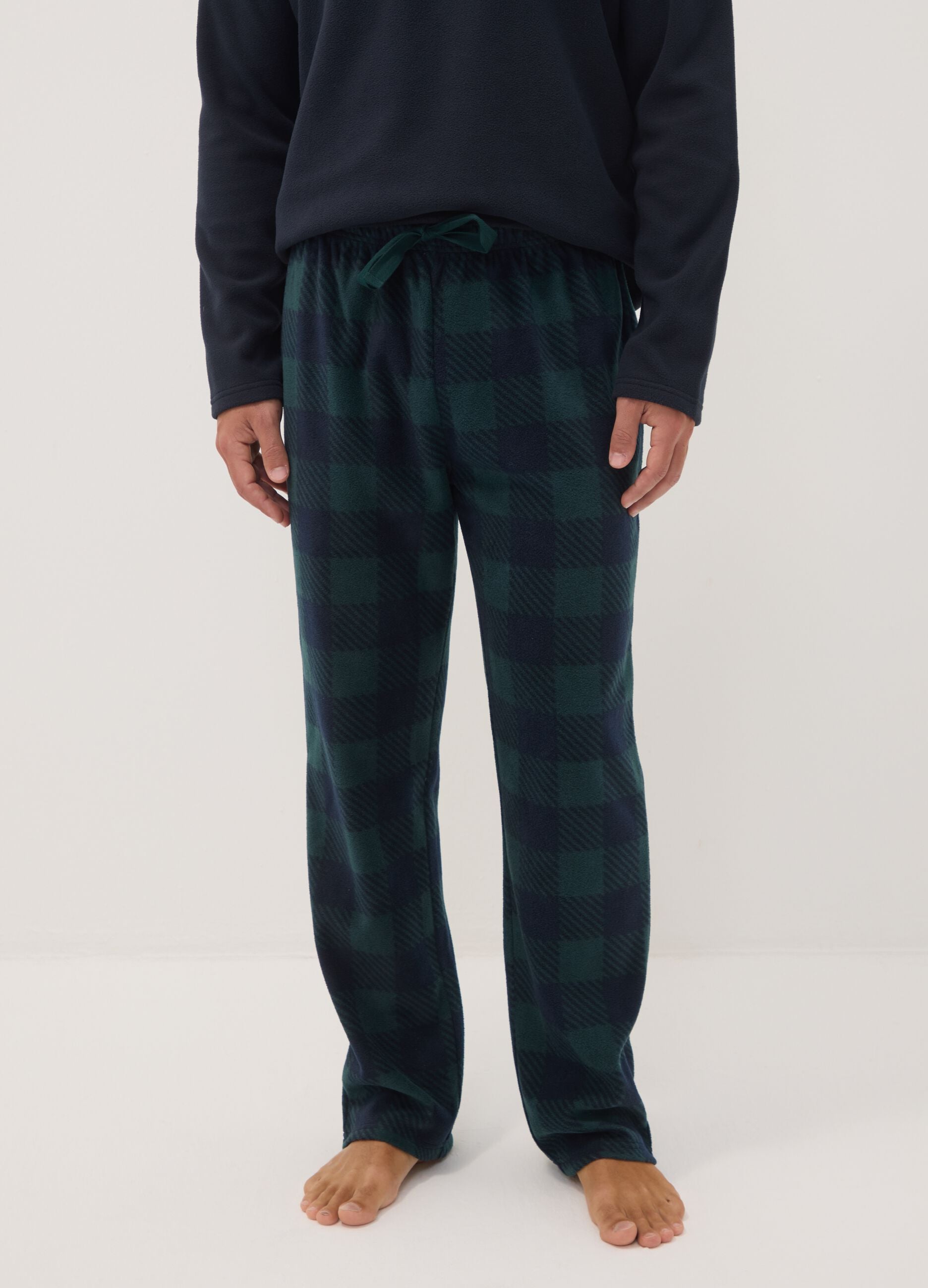 Navy blue long pyjamas with crew neck top and check trousers