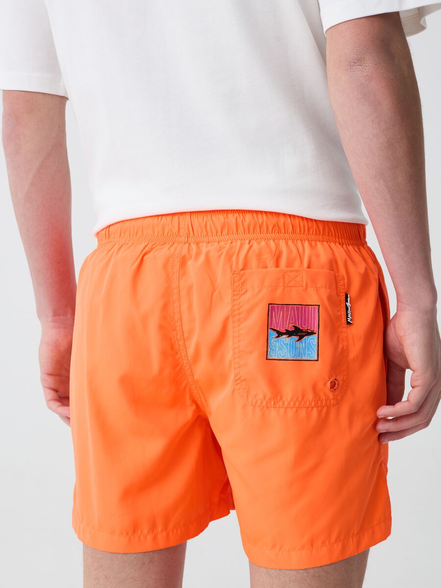 Fluorescent swimming trunks with logo patch_1