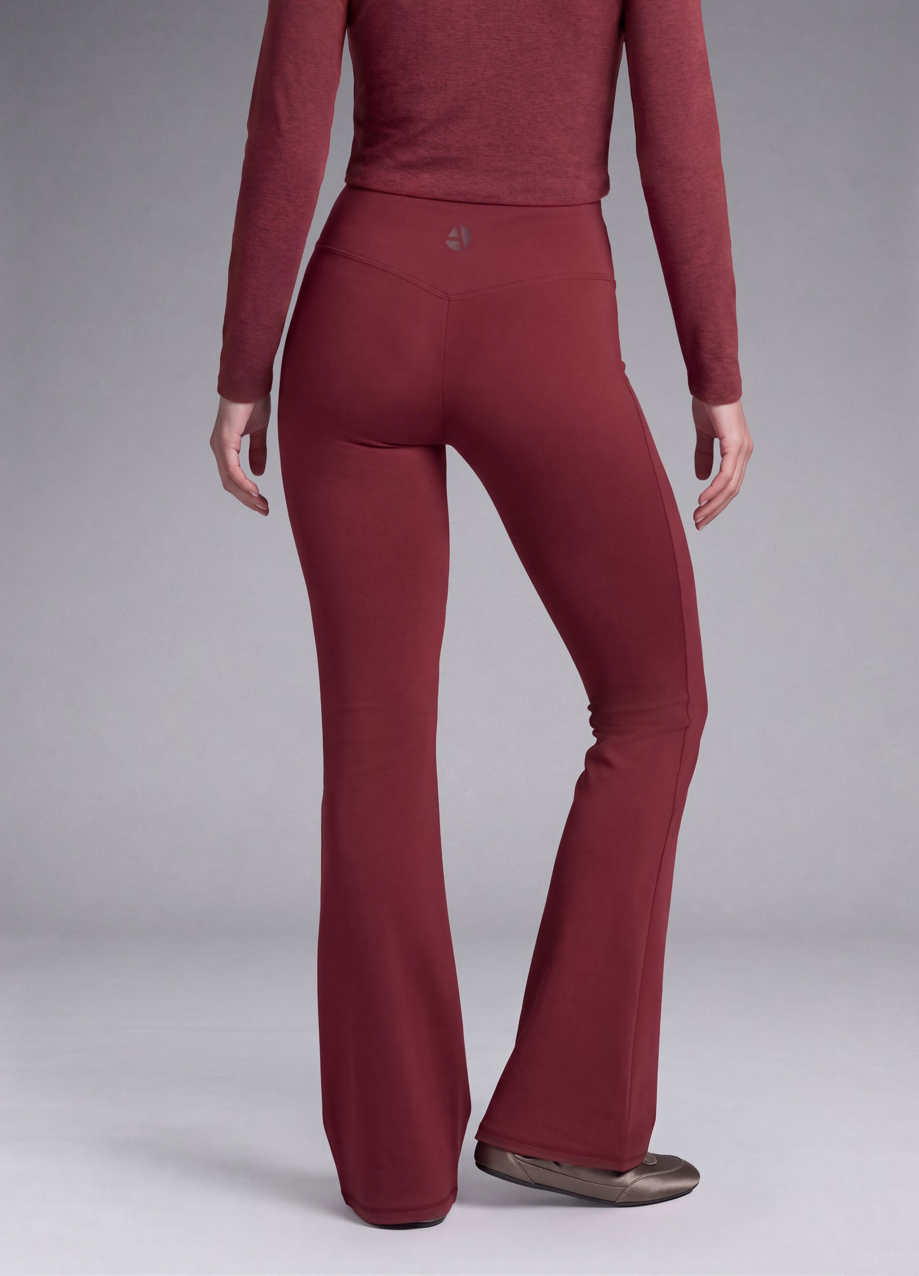 Red flared leggings in stretch fabric