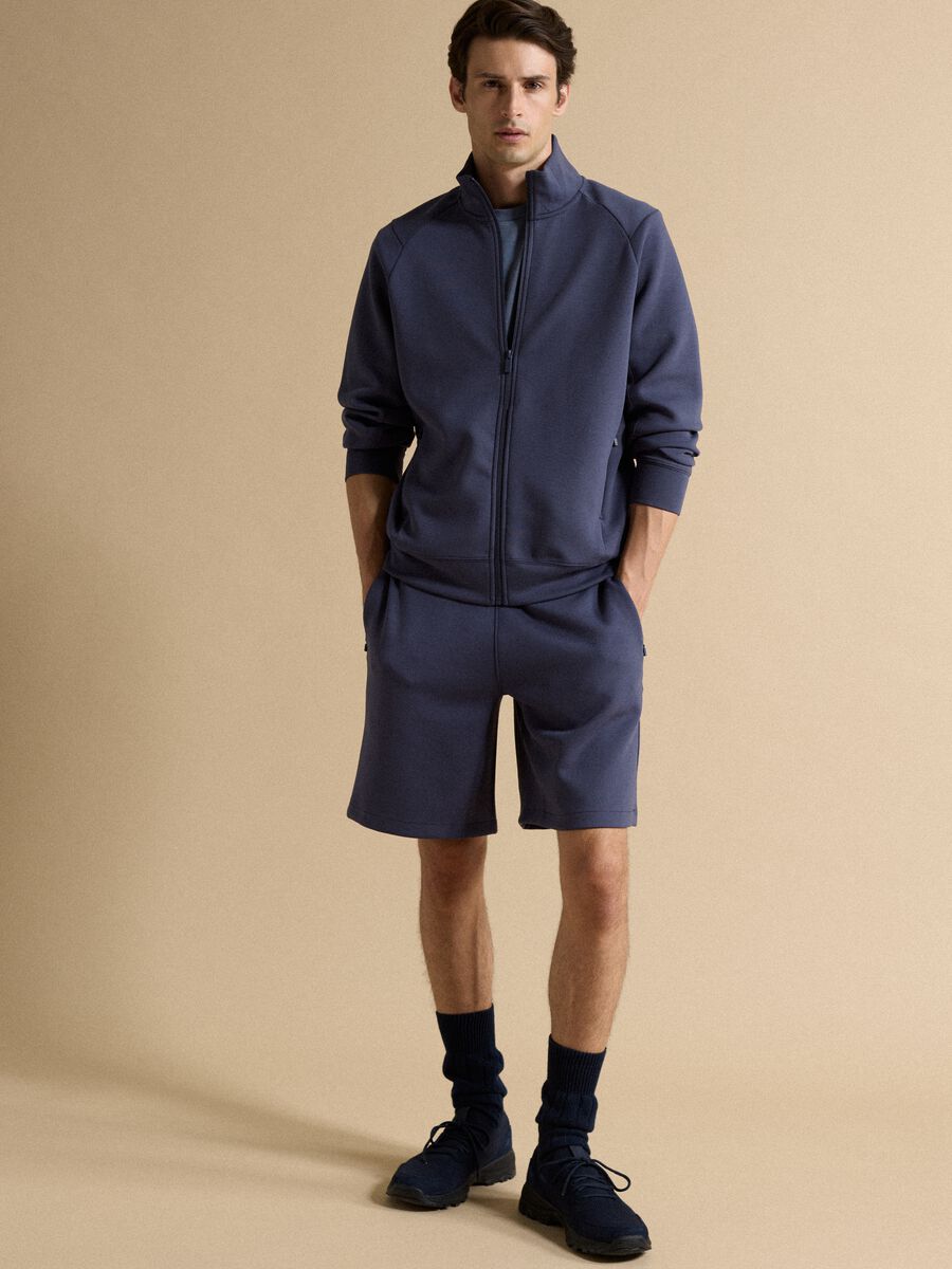 Blaue Full-Zip-Jacke mit Kragen aus elastischem Easy-Dry-Gewebe, Regular Fit_1