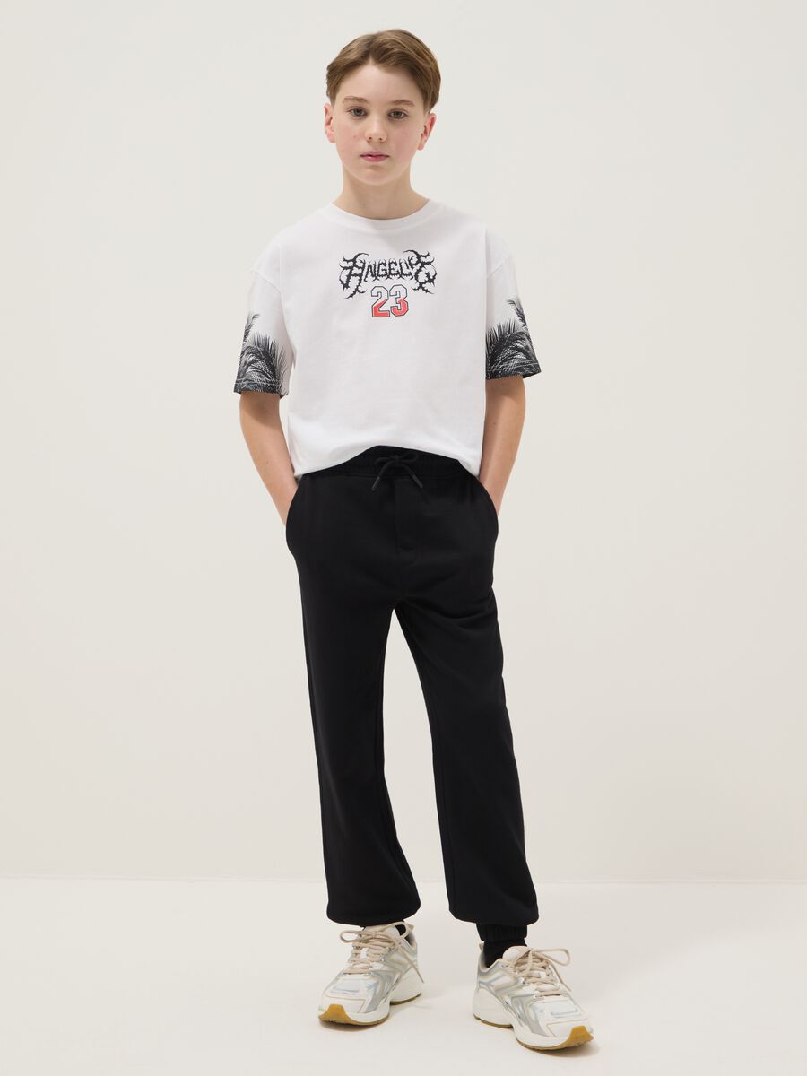 Black cotton and viscose mix regular fit jogger trousers for boys_0