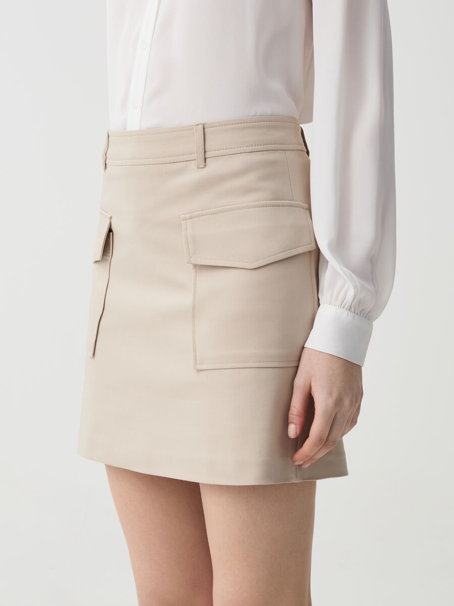 Stretch miniskirt with pockets_1