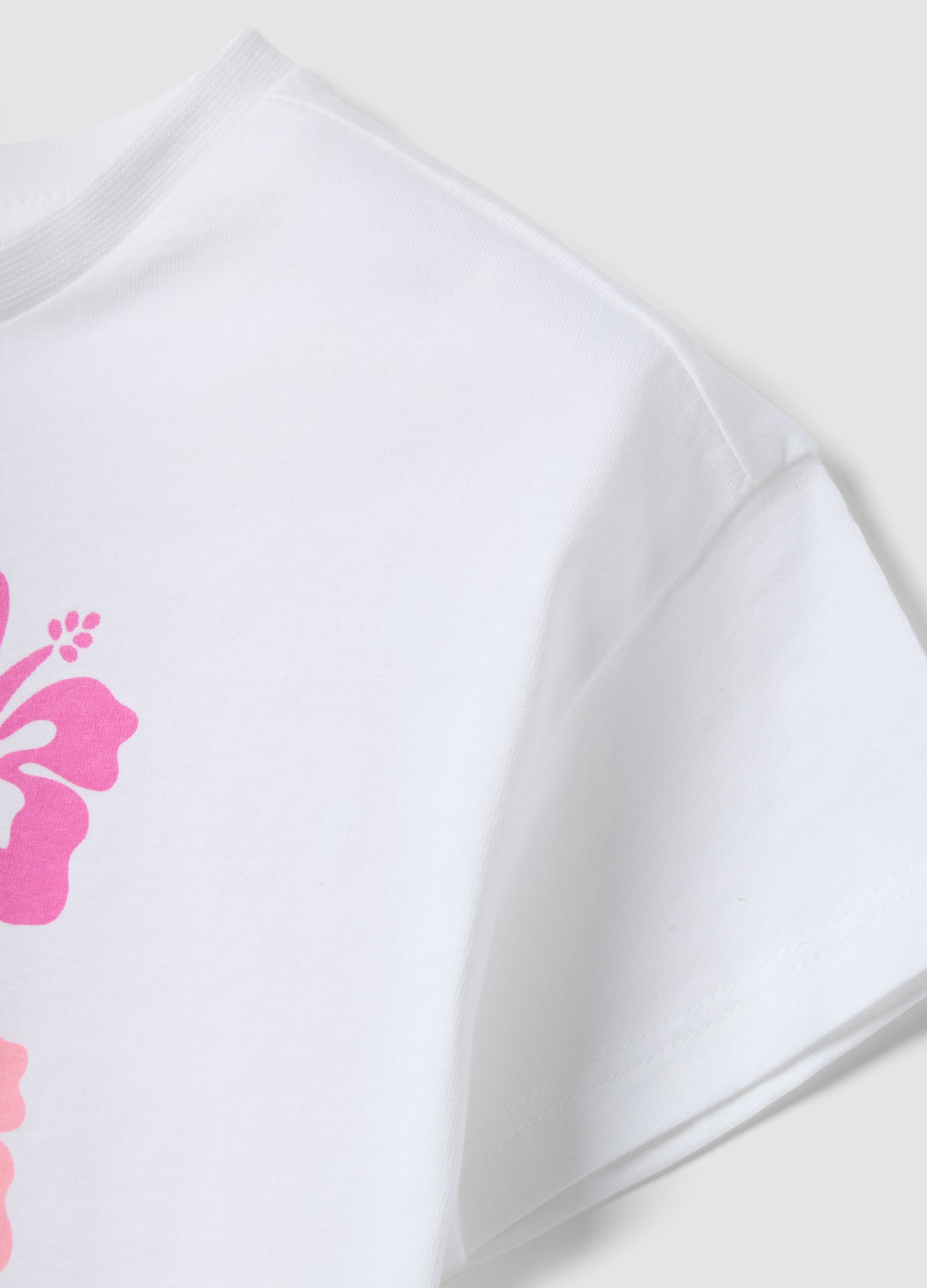 White pure cotton T-shirt with floral print and fringed hem