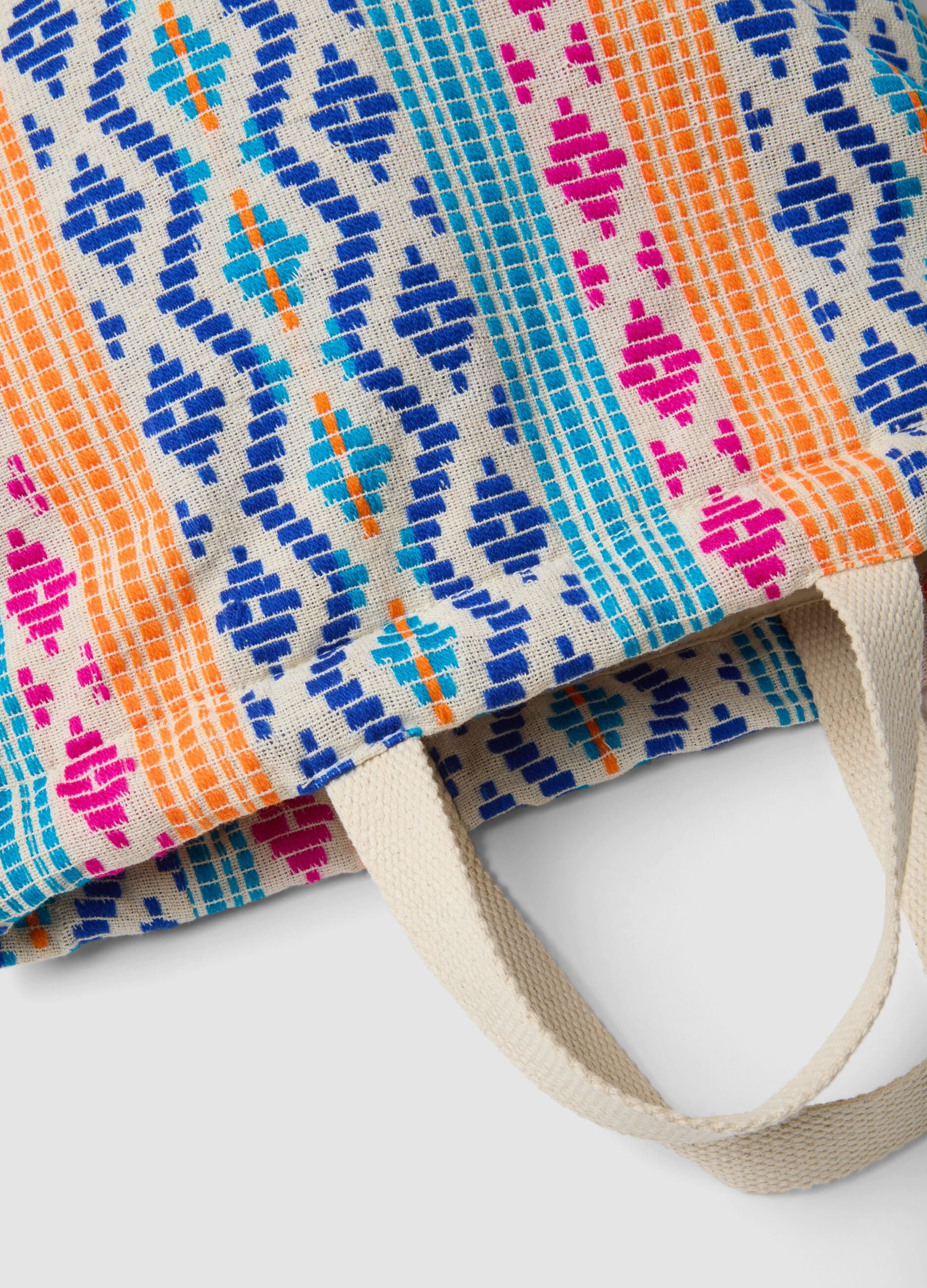 Multicolour patterned backpack with adjustable shoulder straps