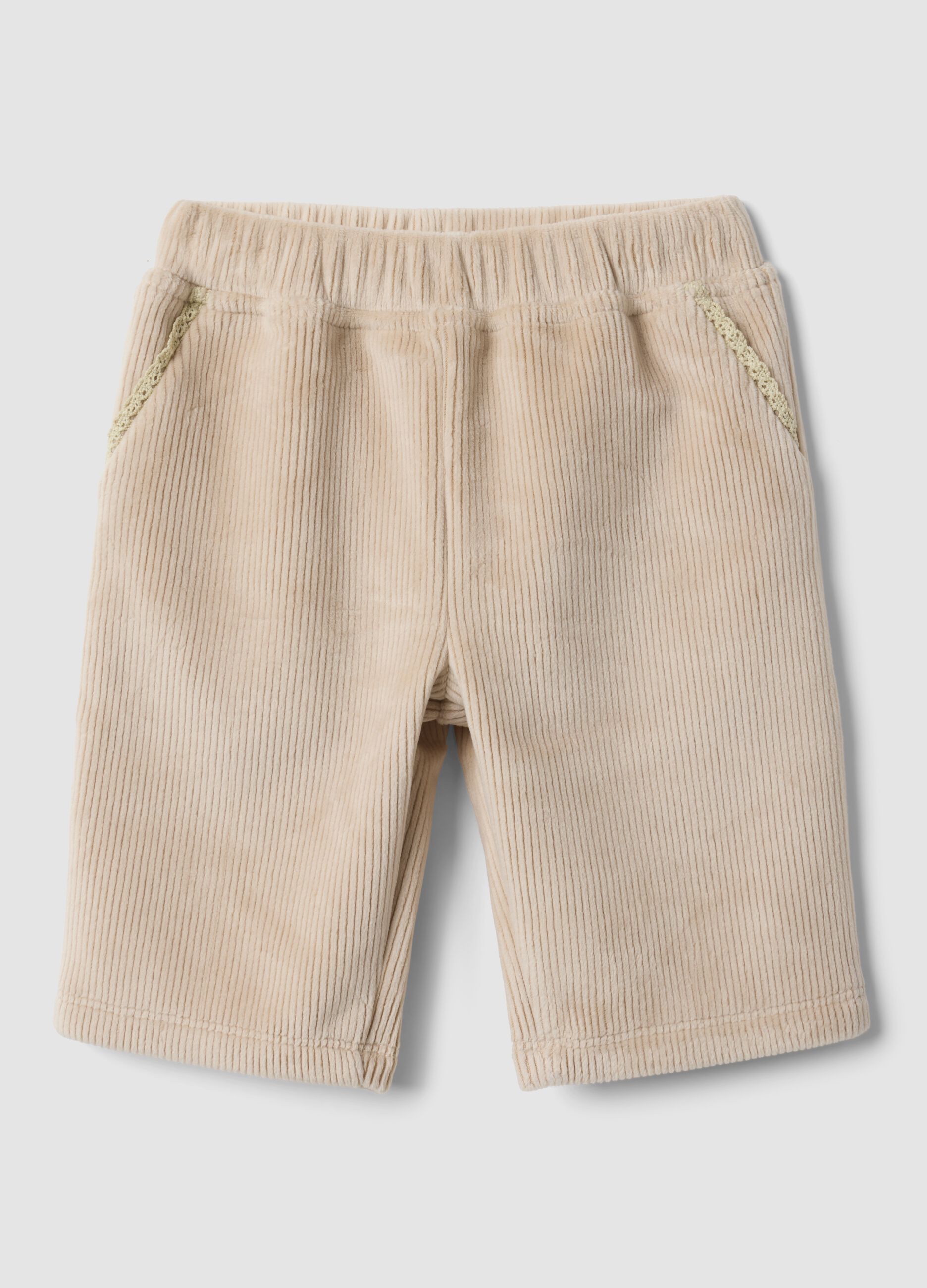 Pantaloni beige in tessuto elasticizzato a coste per neonata