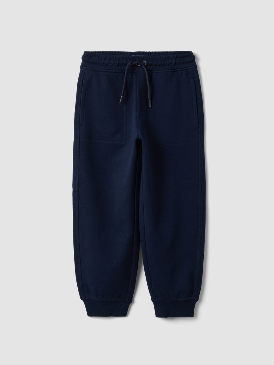Pantaloni jogger blu in puro cotone con vita elasticizzata per bambino_0