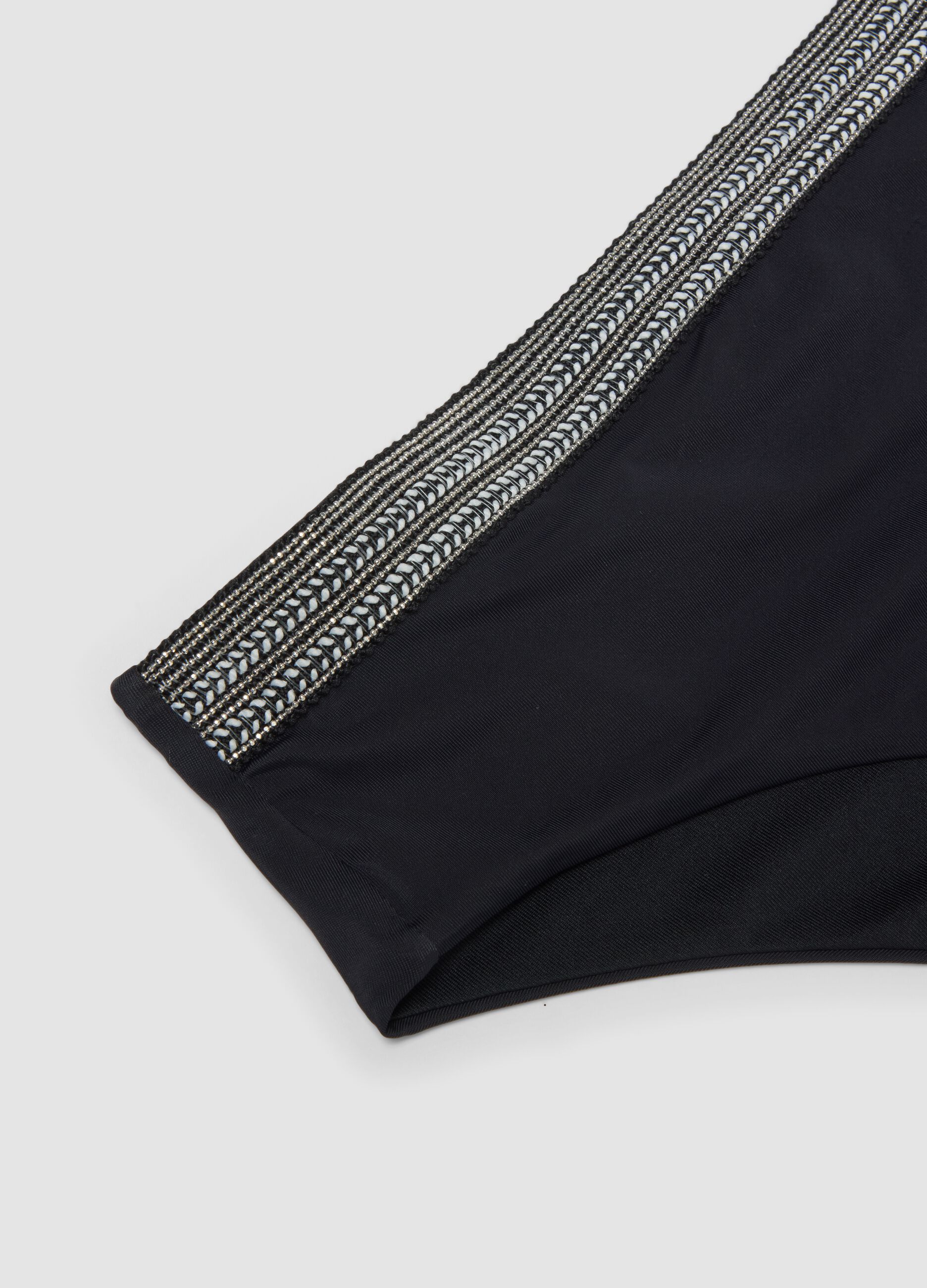 Black stretch swim briefs with embroidered details