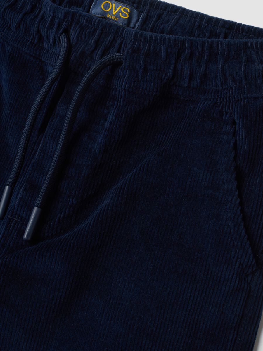 Pantaloni blu scuro in cotone elasticizzato a coste_2