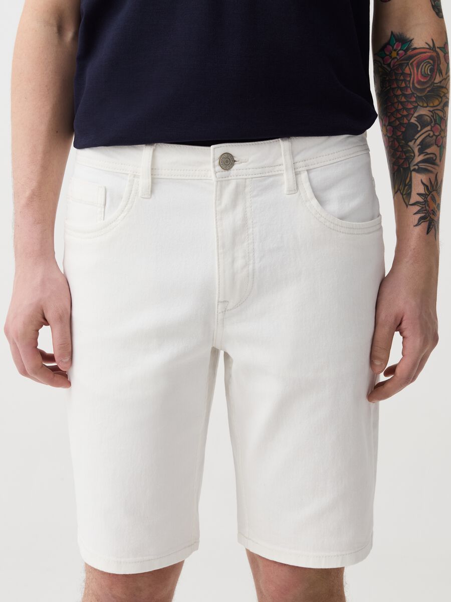 Regular-fit Bermuda shorts in solid colour denim_1
